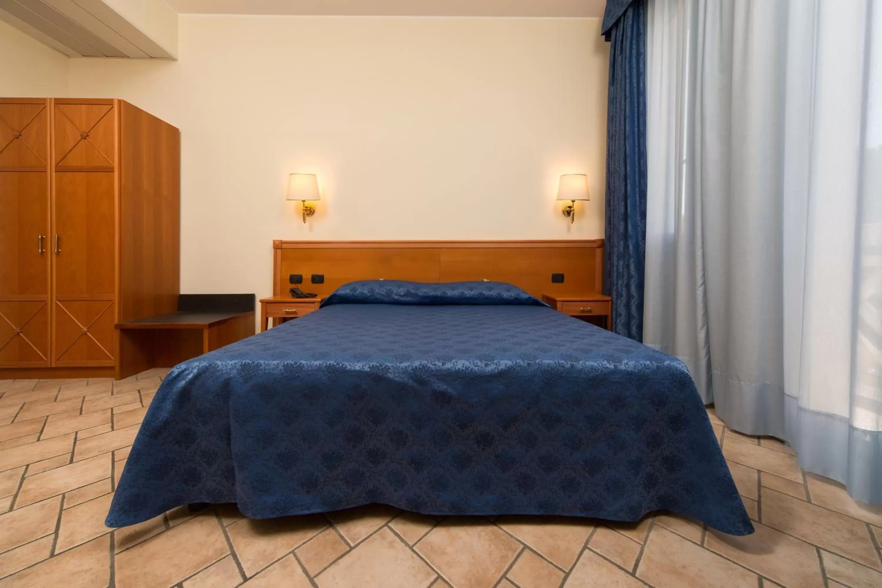 Bed in Hotel Giotto