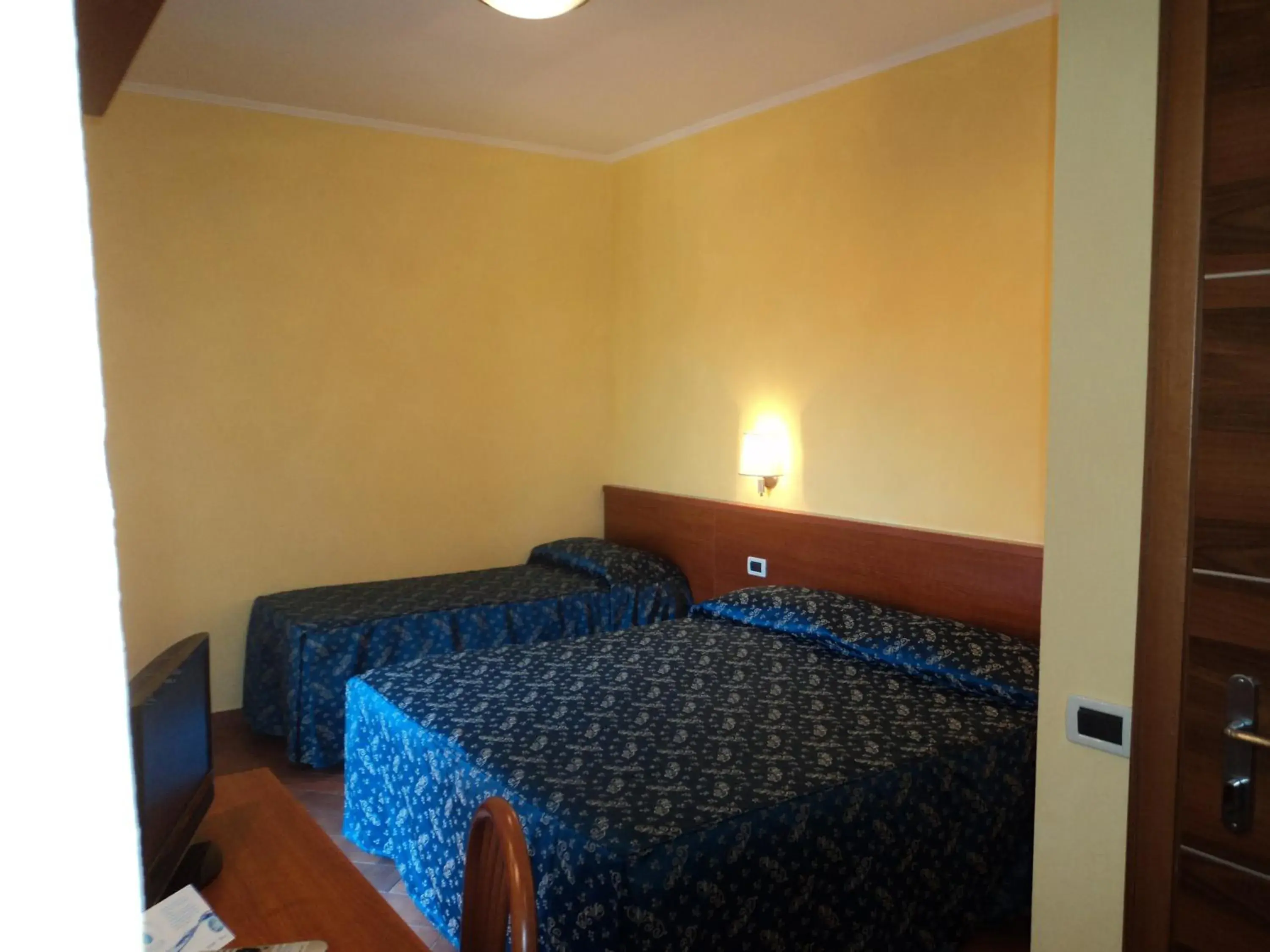 Bed in Albergo Dei Leoni