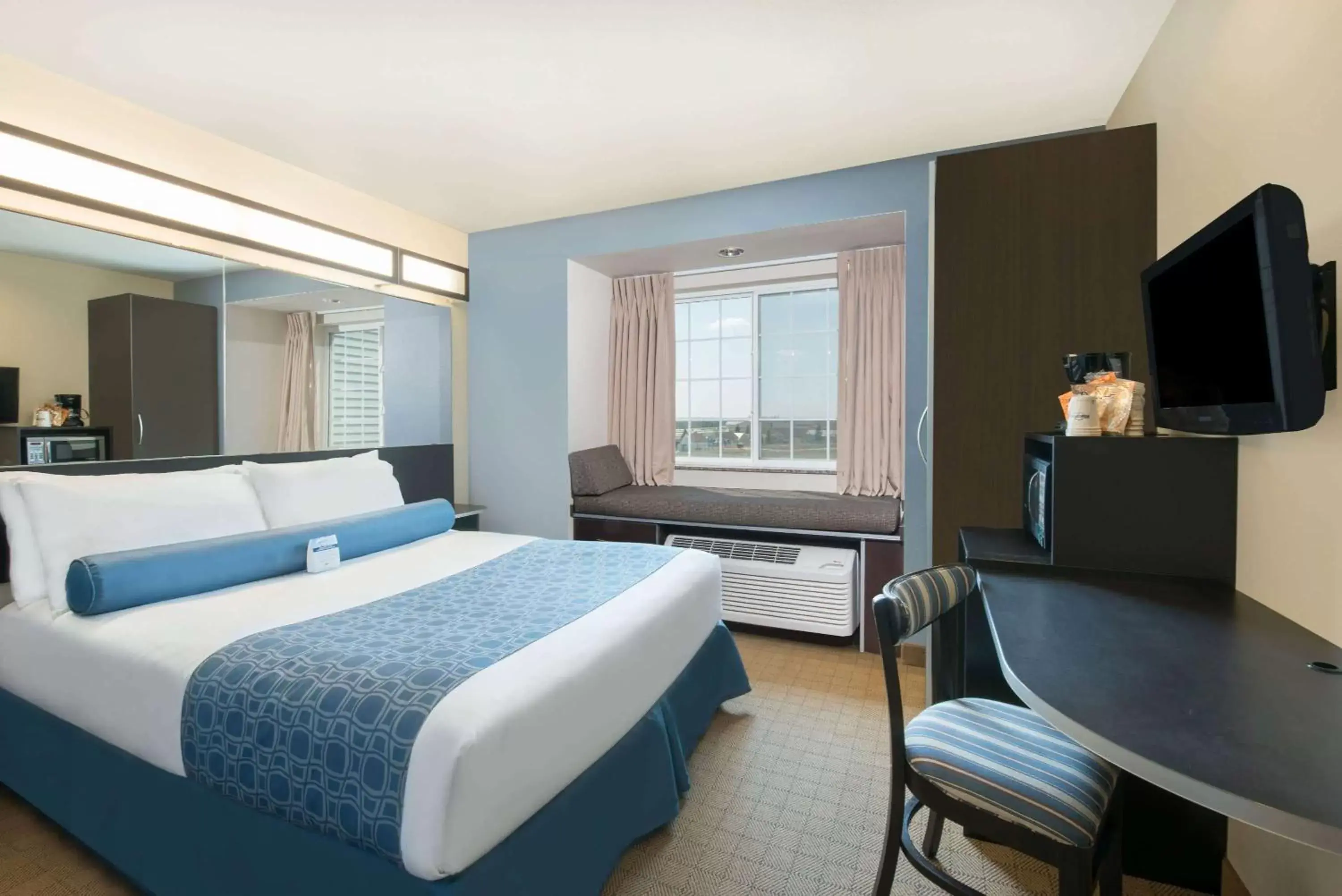 Photo of the whole room, Bed in Microtel Inn & Suites by Wyndham Stanley Photo of the whole room, Bed in Microtel Inn & Suites by Wyndham Stanley