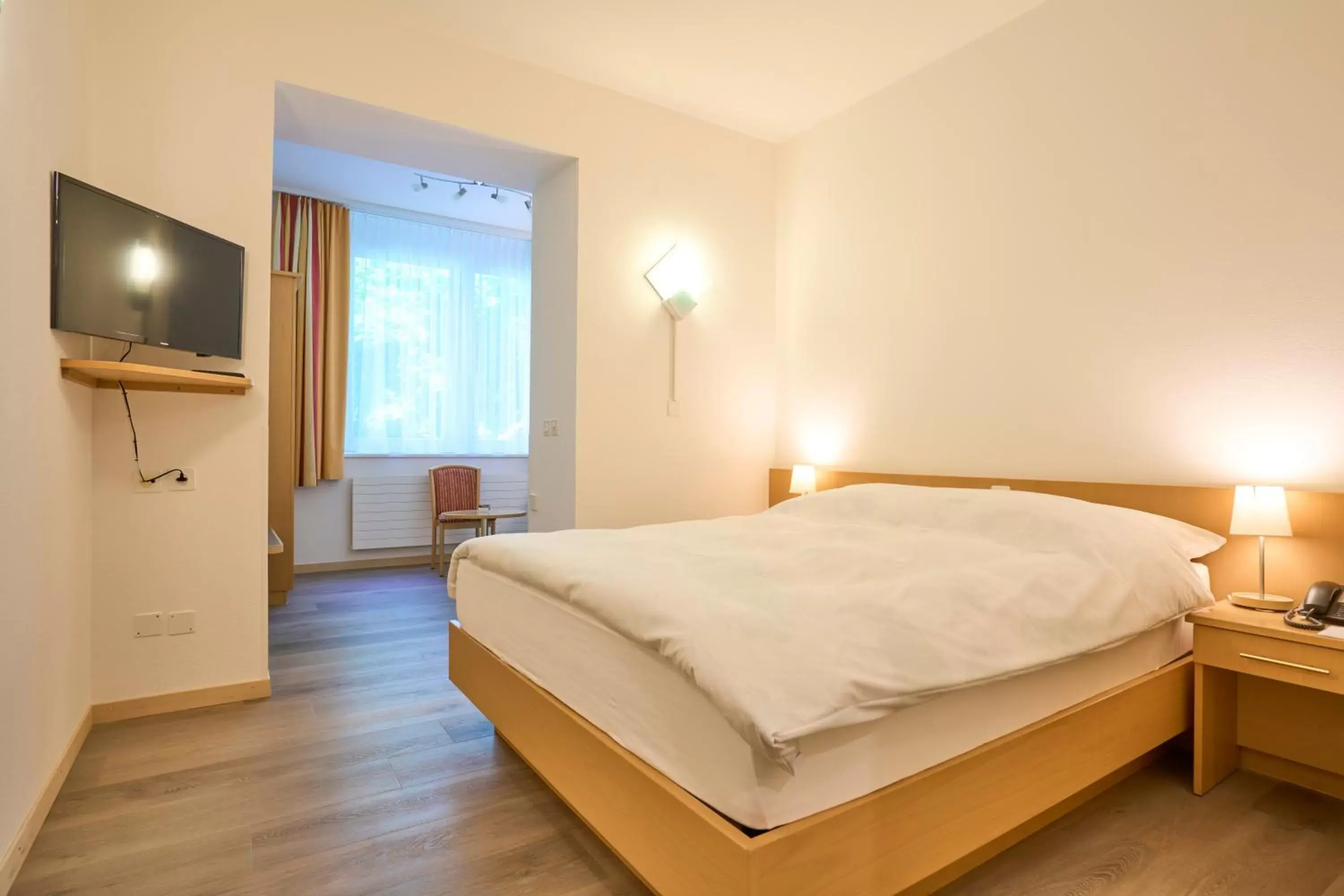 Garden view, Bed in Hotel Promenade