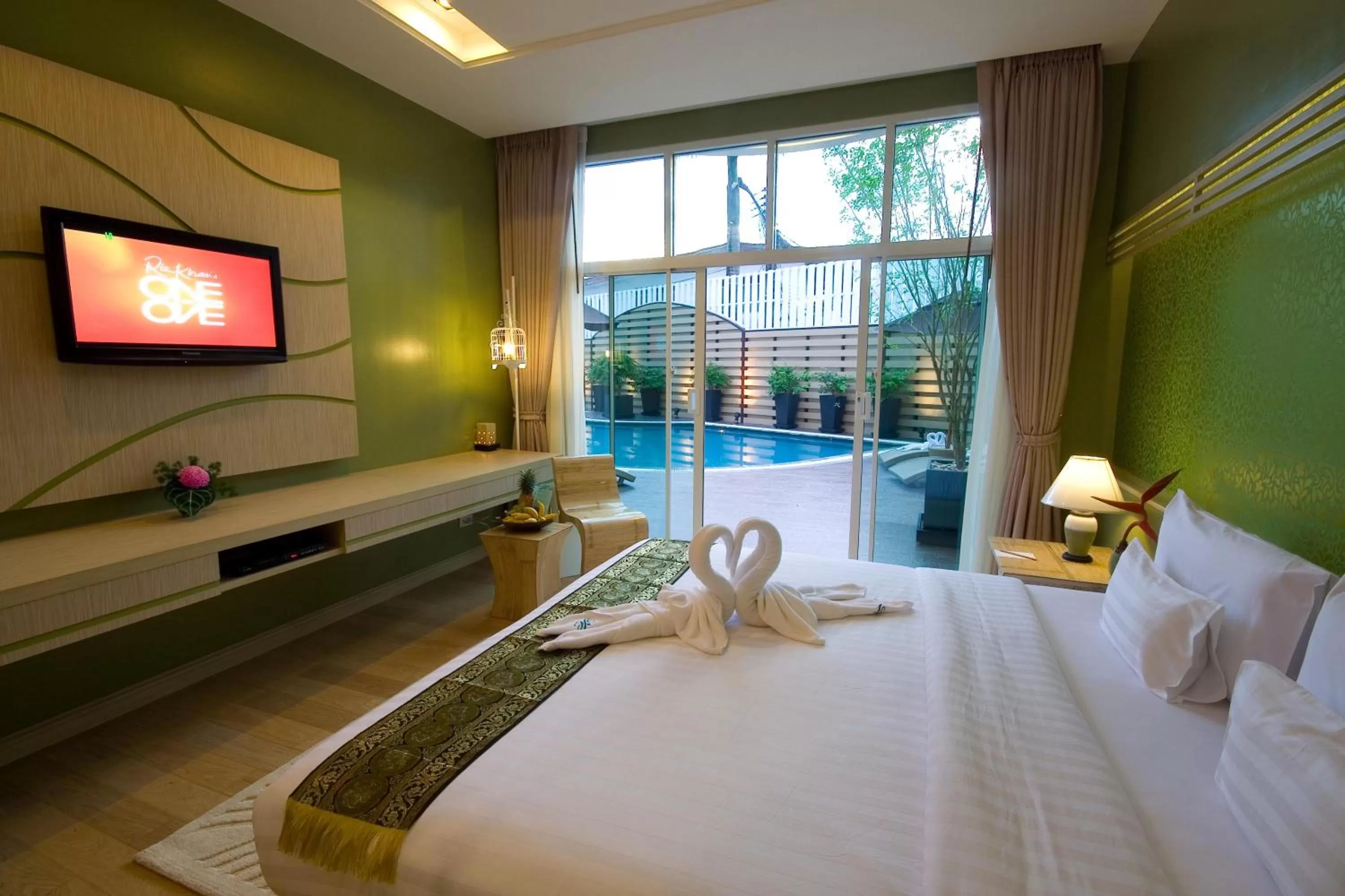 Photo of the whole room, Bed in A-Te Chumphon Hotel - SHA Plus
