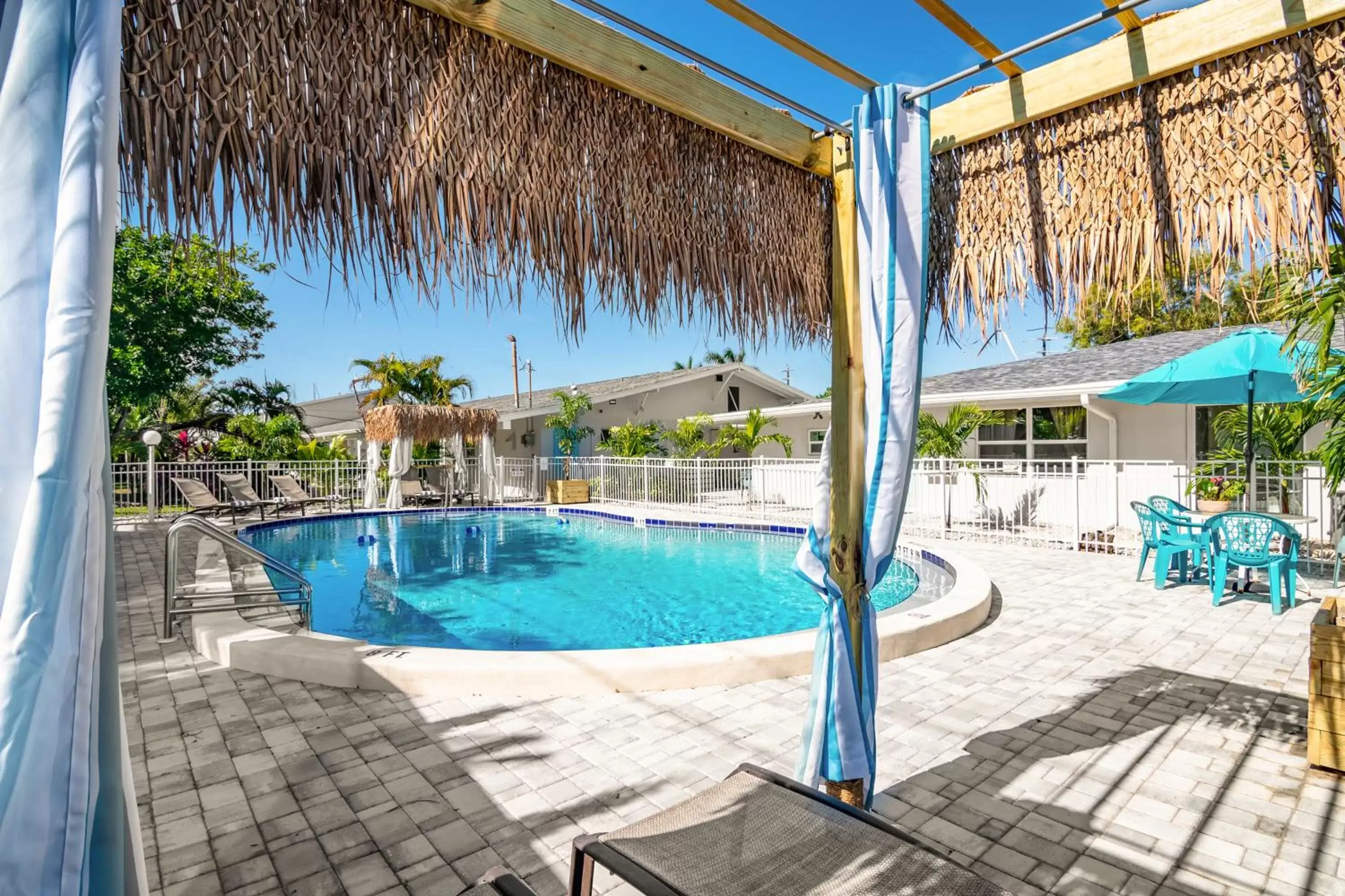 Swimming pool in Latitude 26 Waterfront Boutique Resort - Fort Myers Beach