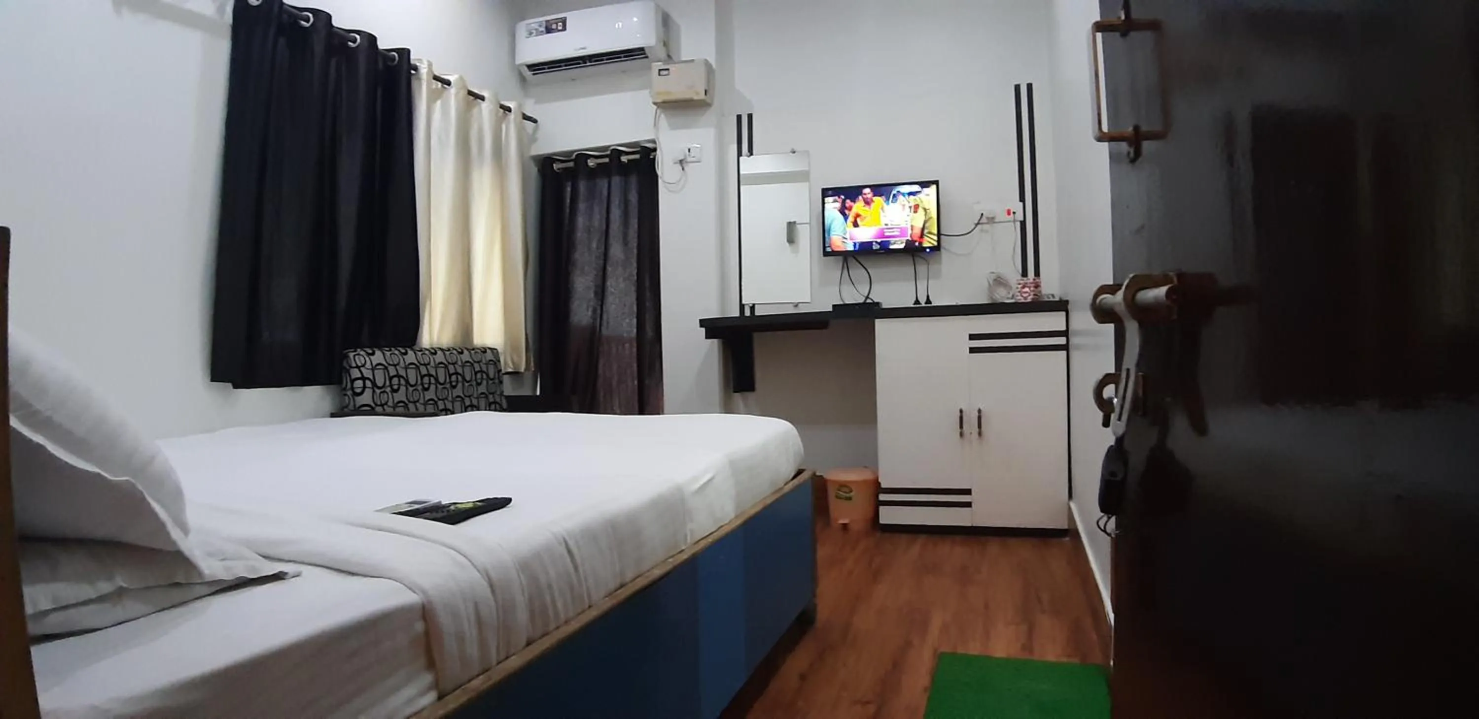 Photo of the whole room, TV/Entertainment Center in Hotel Sita (place on the heritage ghats of benaras)