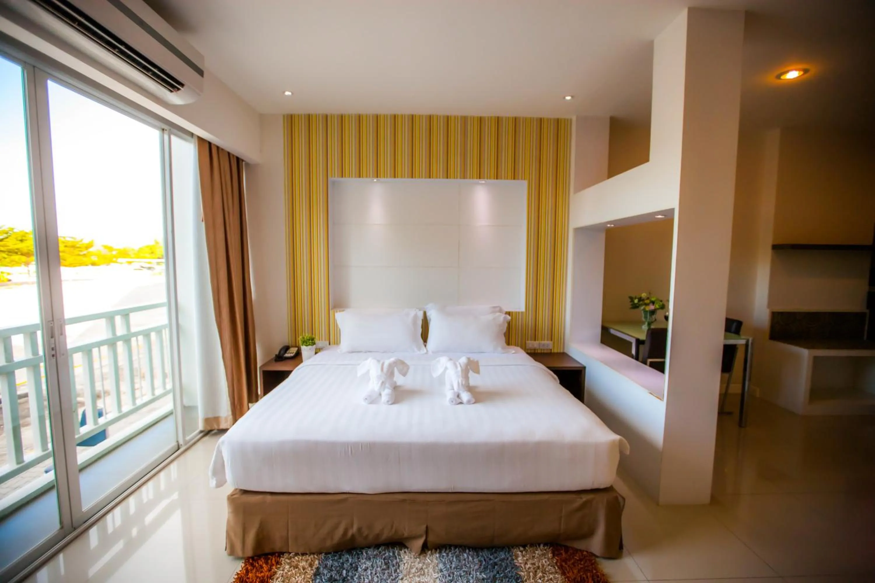 Bed in Golden City Rayong Hotel