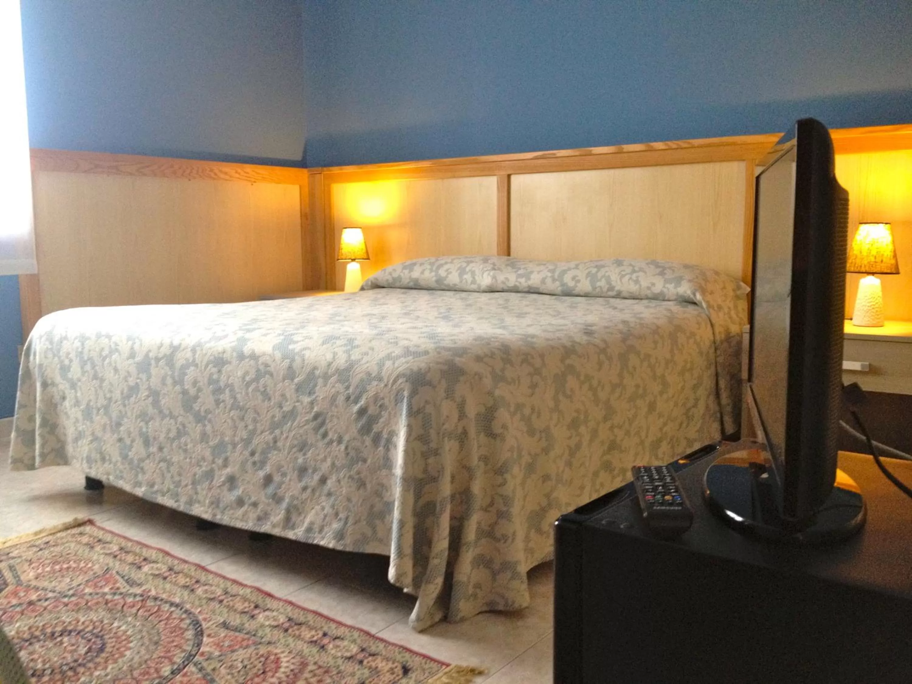 Bed in Hotel Monumento