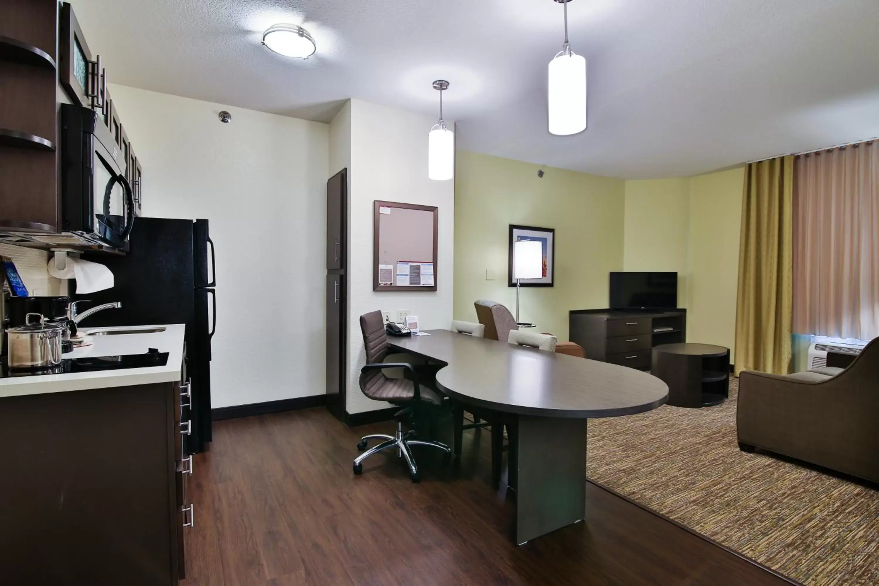 Photo of the whole room, TV/Entertainment Center in Candlewood Suites Bismarck