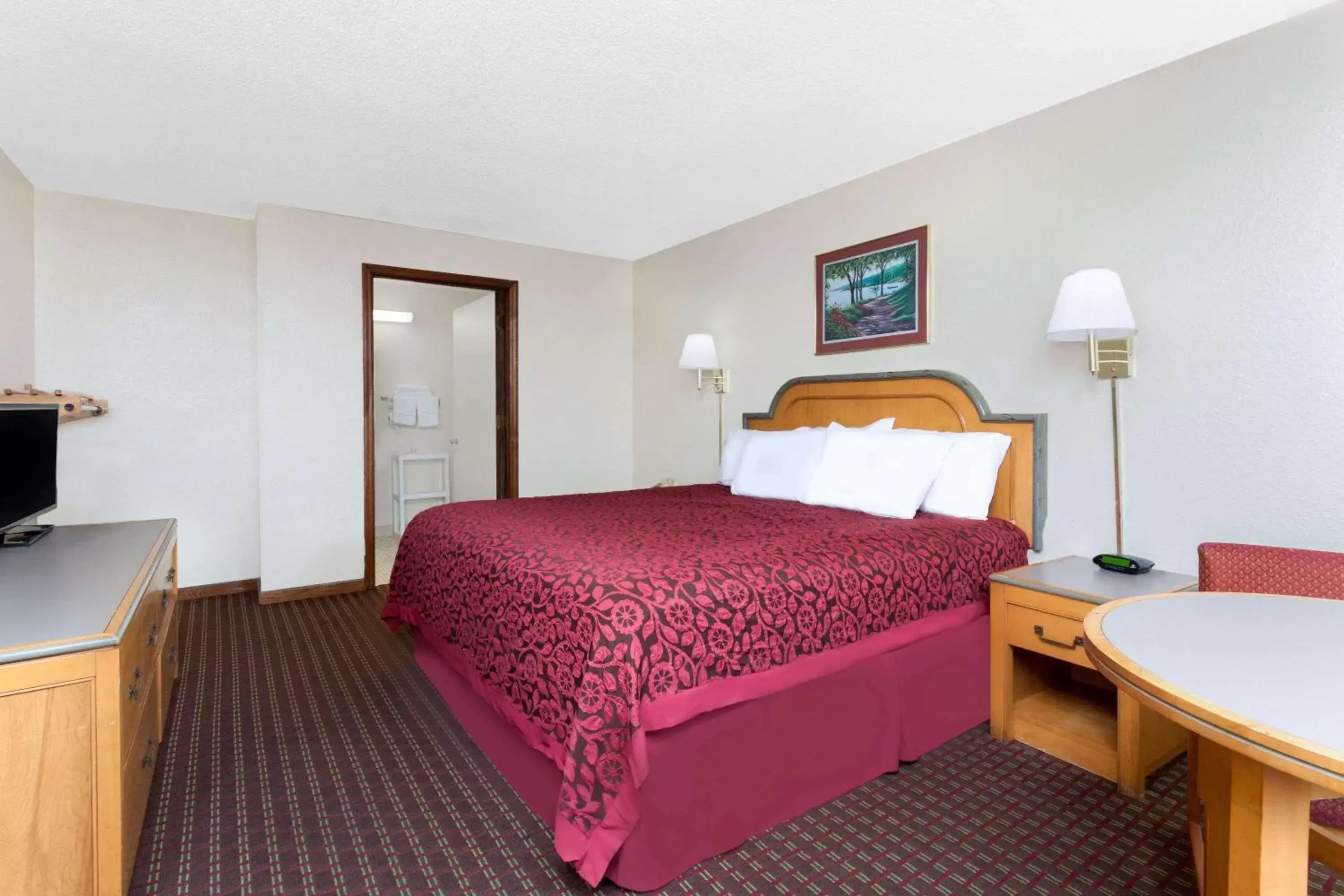 Photo of the whole room, Bed in Days Inn by Wyndham Columbia NE Fort Jackson