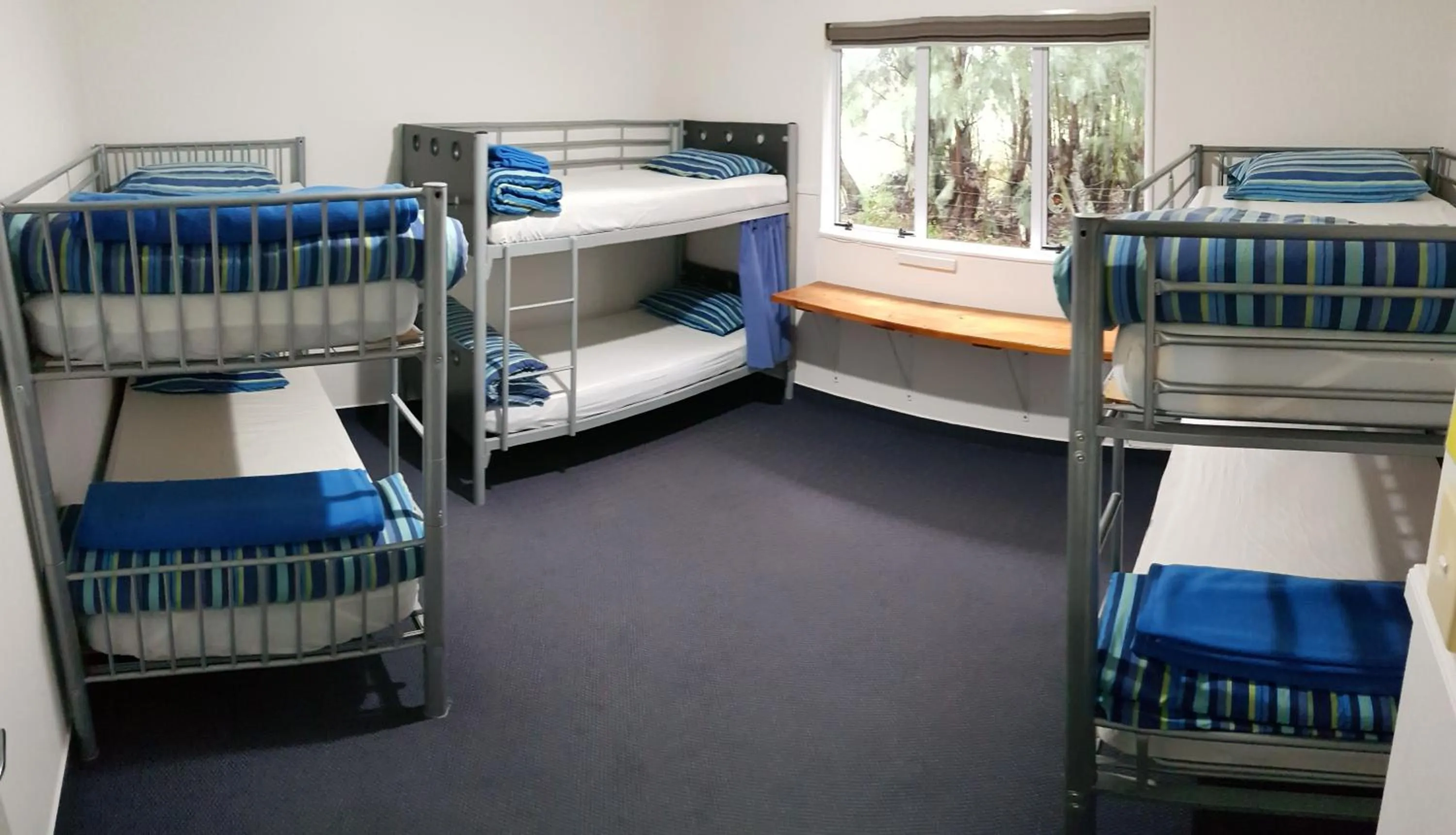 Single Bed in 6-Bed Dormitory Room in Happy Apple Backpackers
