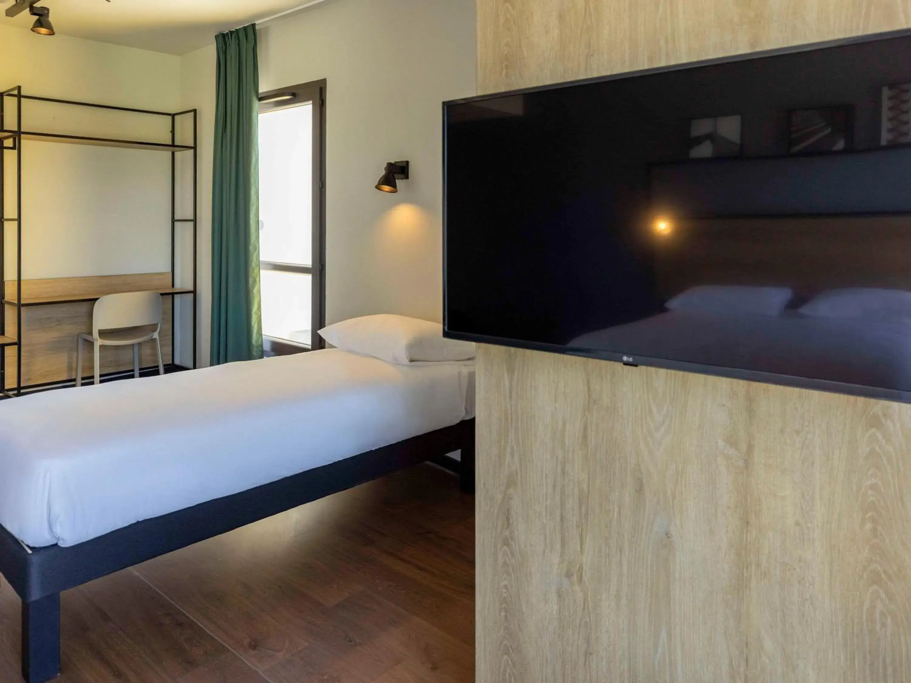 Photo of the whole room, Bed in Ibis Marseille Marignane Technopole