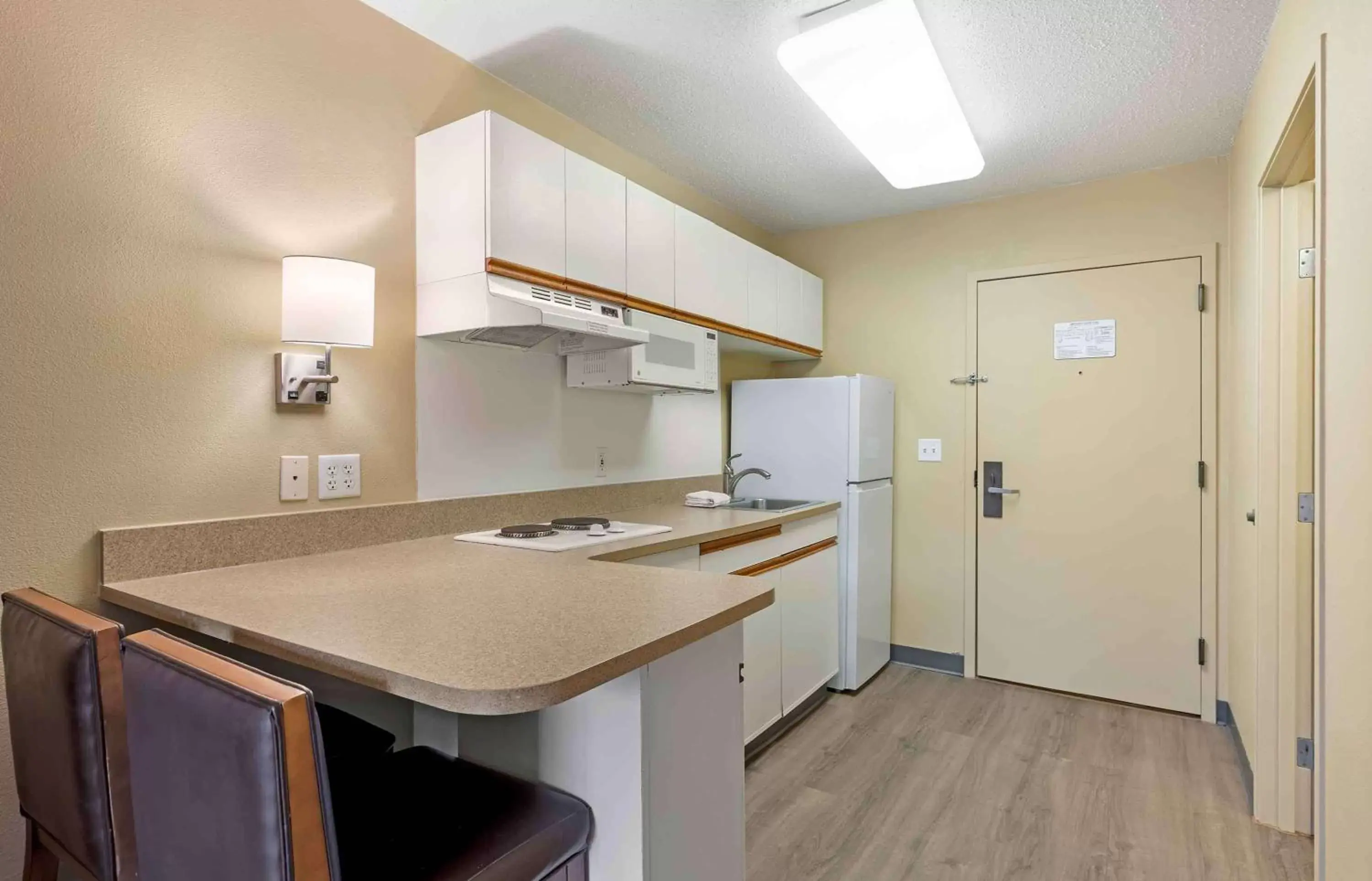 Bedroom, Kitchen/Kitchenette in Extended Stay America Suites - St Louis - Airport - Central