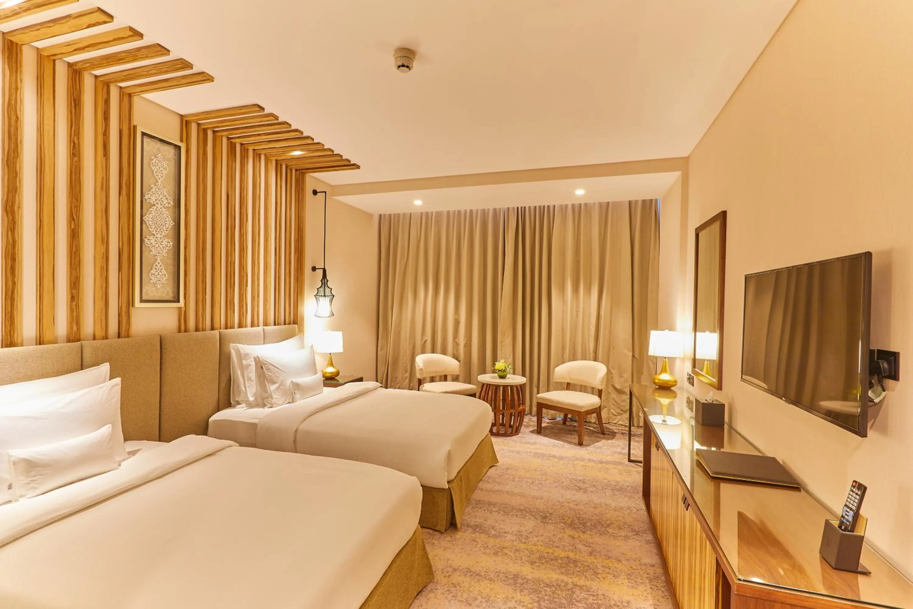 Bedroom, Bed in Millennium Resort Salalah
