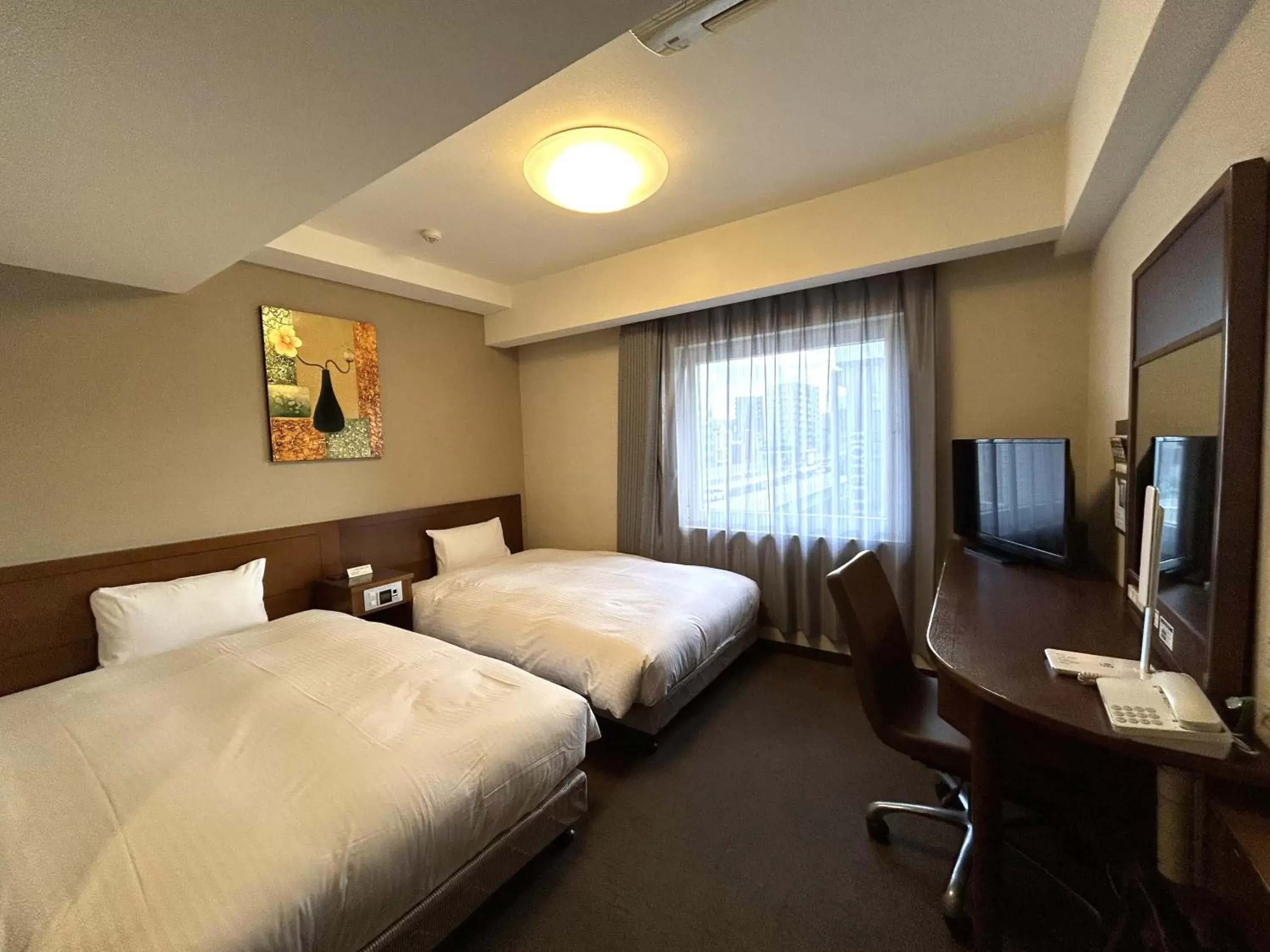 Photo of the whole room, Bed in Hotel Route-Inn Nagoya Sakae