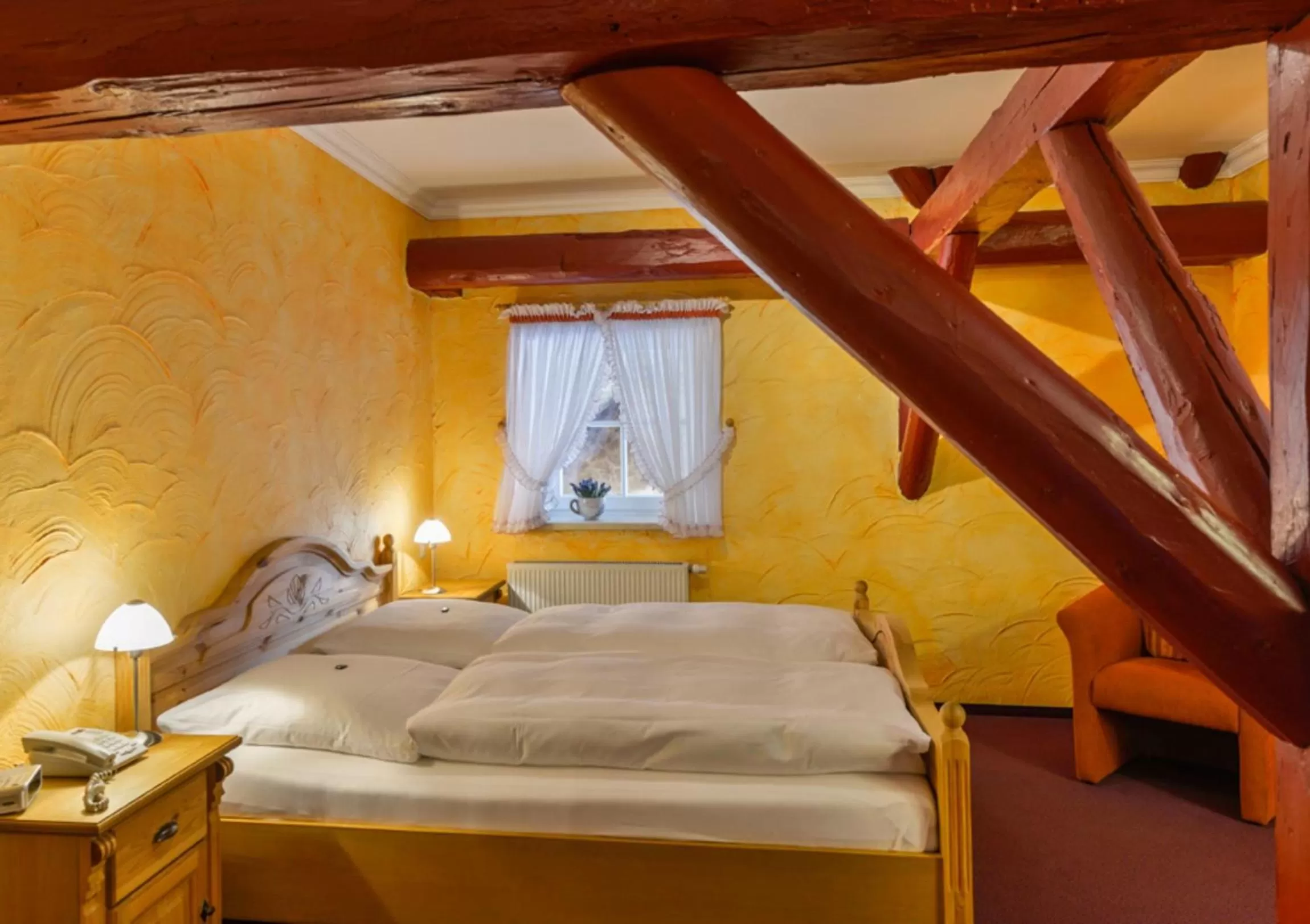 Photo of the whole room, Bed in Hotel Gut Voigtlaender
