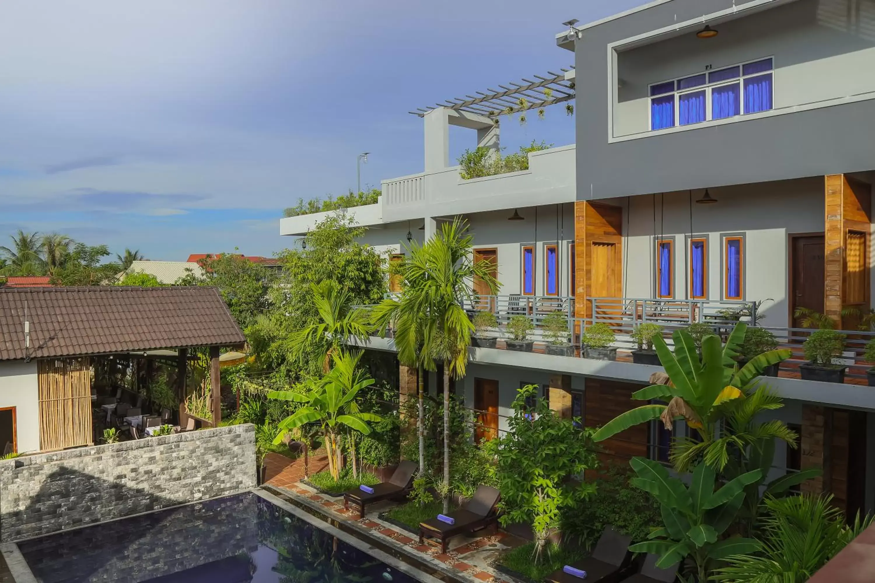 Swimming pool, Property Building in Indra Porak Residence Hotel