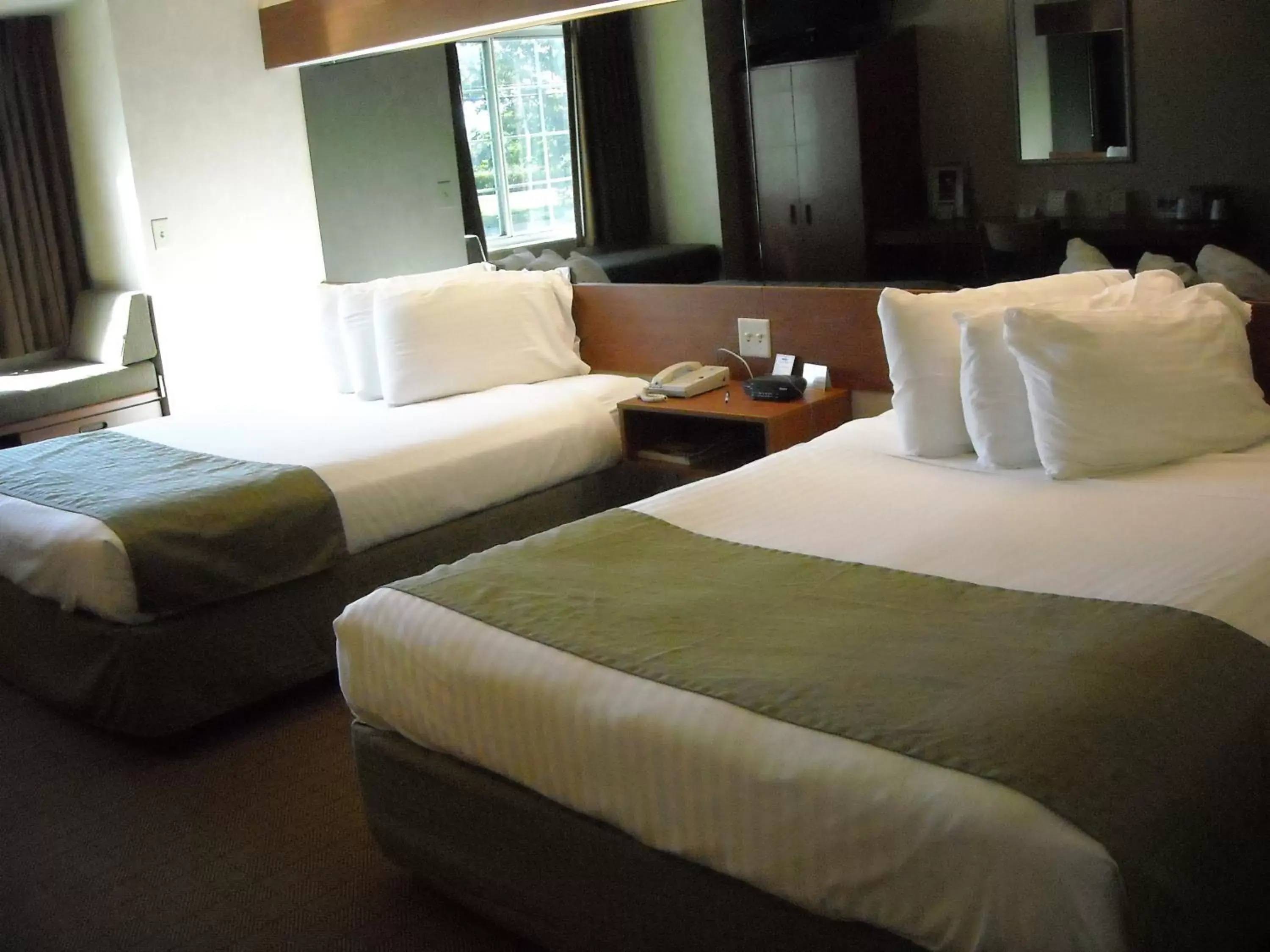 Bedroom, Bed in Microtel Inn & Suites Springville