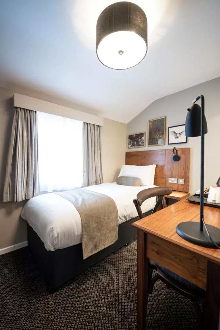 Property building, Bed in The Springfield Inn by Innkeeper's Collection