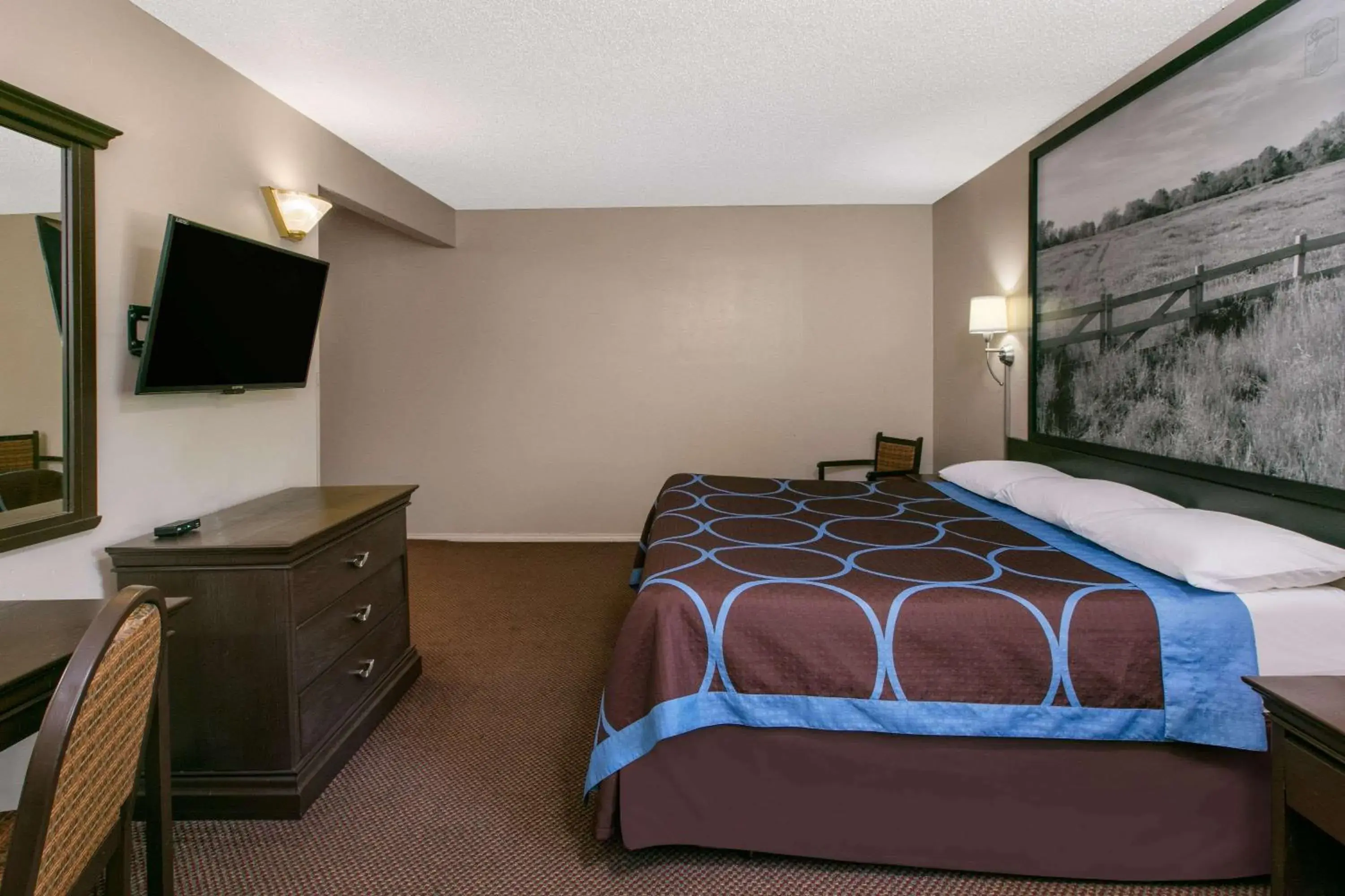 Photo of the whole room, Bed in Super 8 by Wyndham Lubbock Civic Center North
