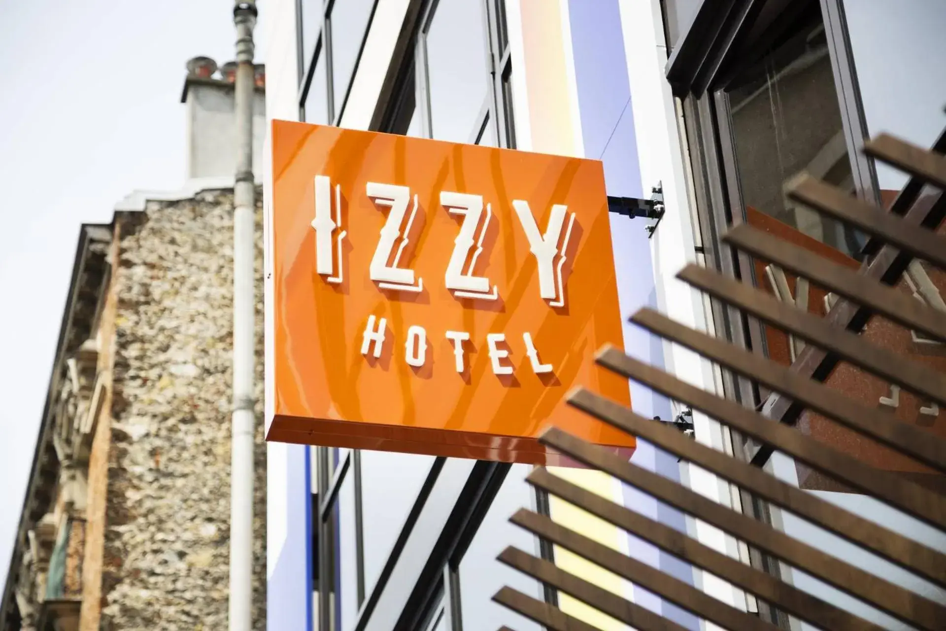 Property building, Property Logo/Sign in Hotel Izzy by HappyCulture