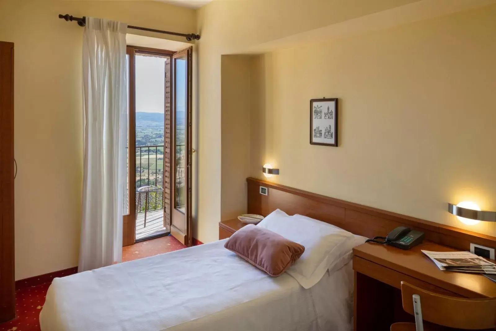 Bed in Hotel Posta Panoramic Assisi