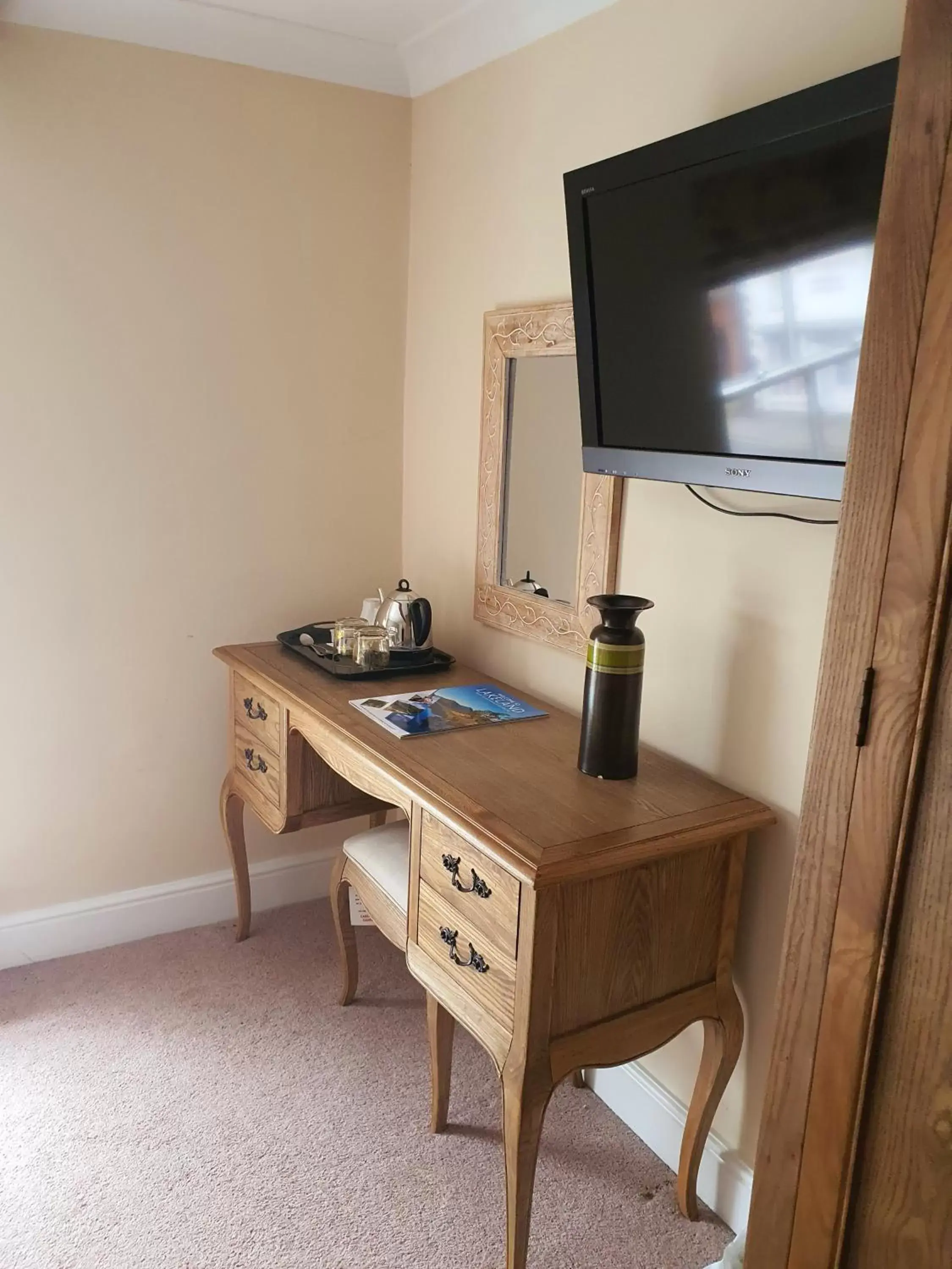 TV/Entertainment Center in Pennine Hotel