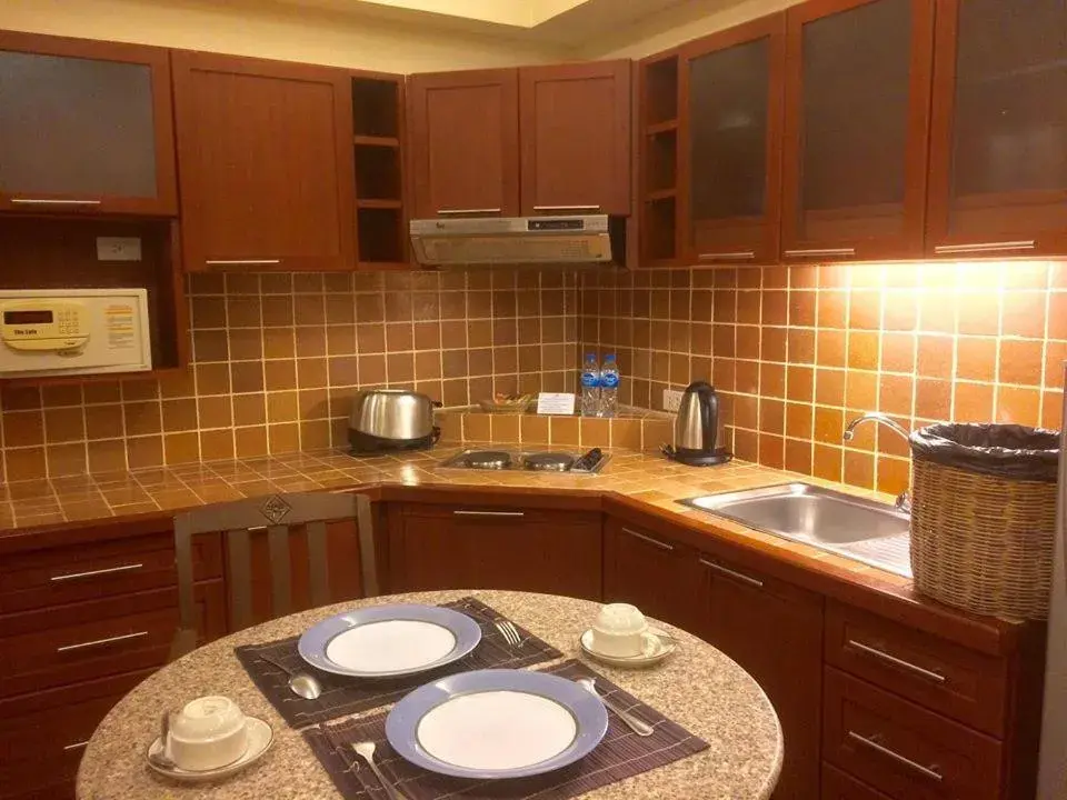 Kitchen or kitchenette, Kitchen/Kitchenette in Nirvana Boutique Suites