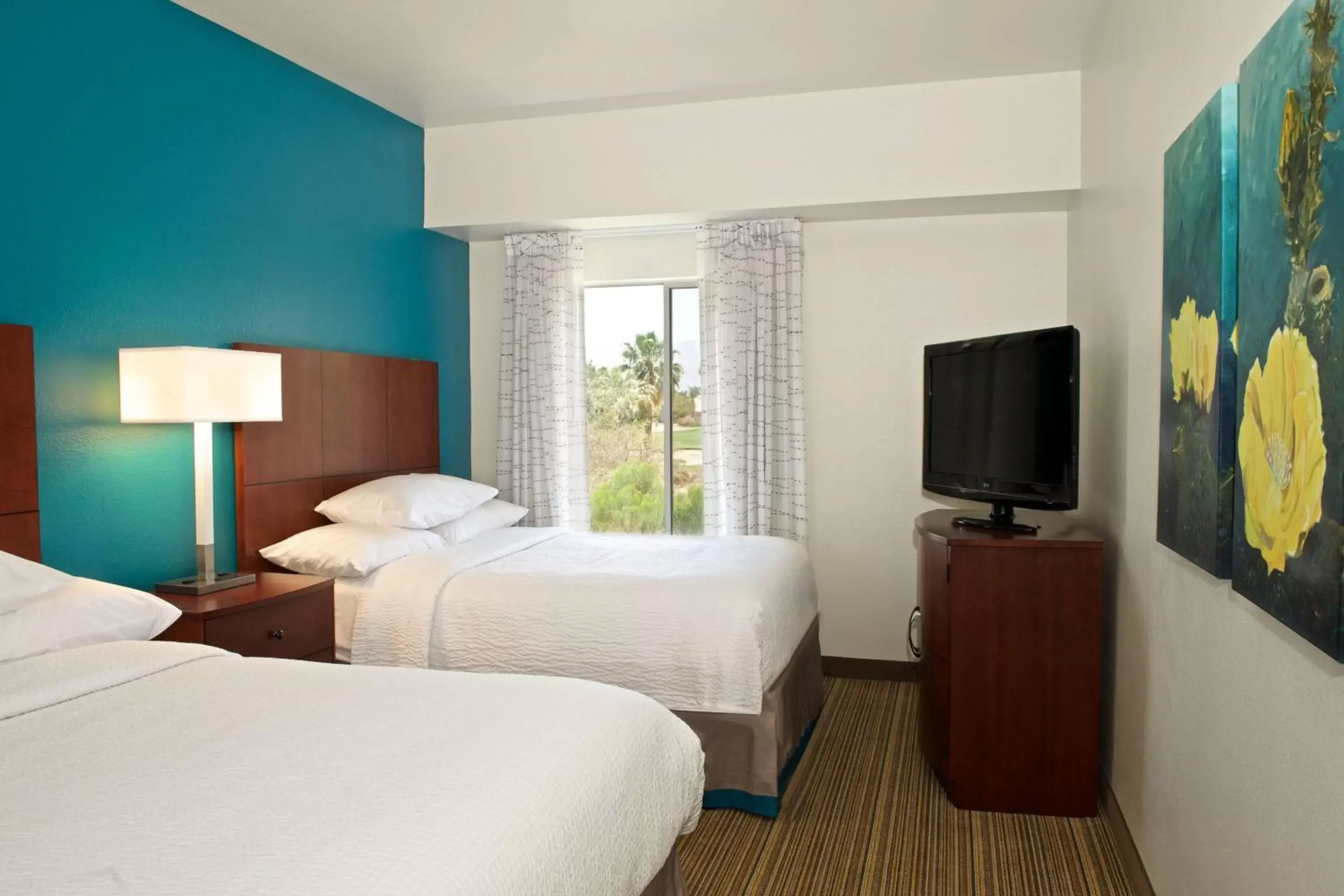 Bedroom, TV/Entertainment Center in Residence Inn Palm Desert