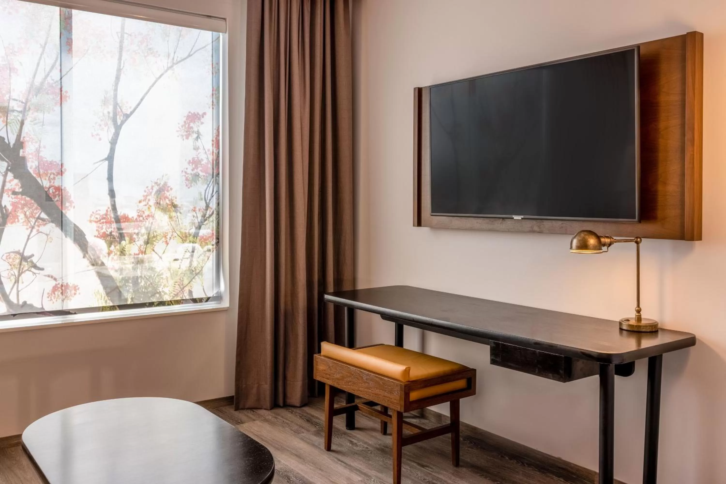 Communal lounge/ TV room in Fairfield by Marriott Inn & Suites Cancun Downtown