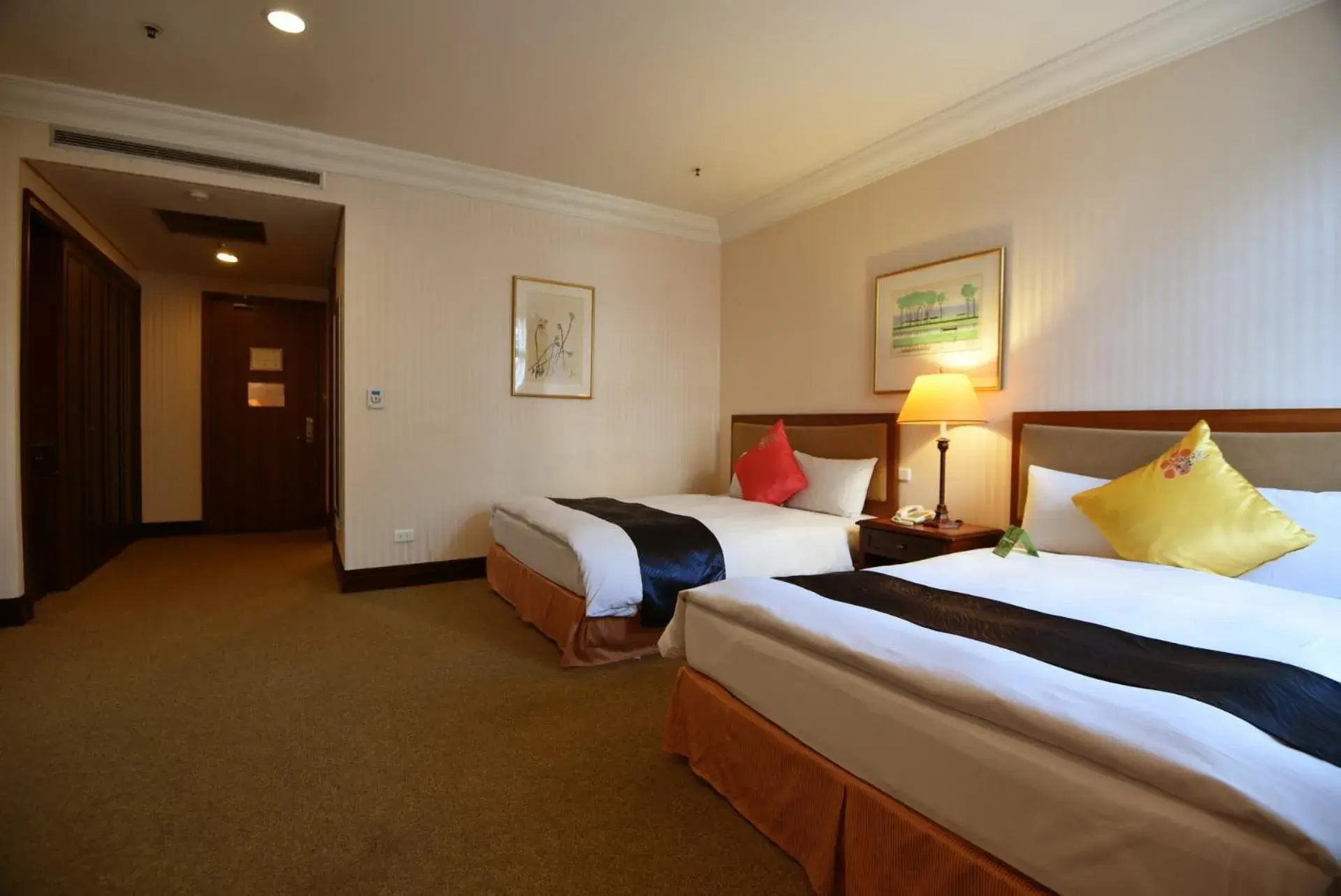 Bed in Wei-Yat Grand Hotel