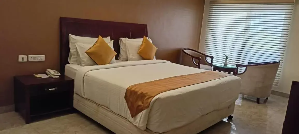 Bed in Ideal Beach Resort