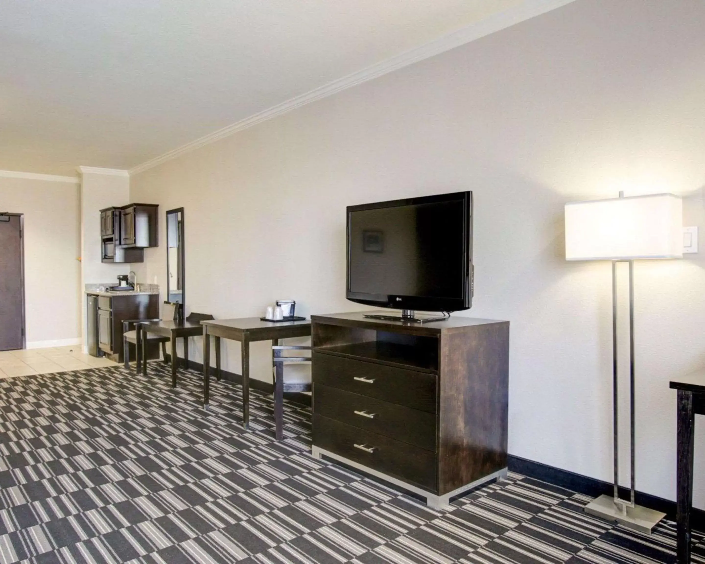 Photo of the whole room, TV/Entertainment Center in Quality Inn & Suites Bryan