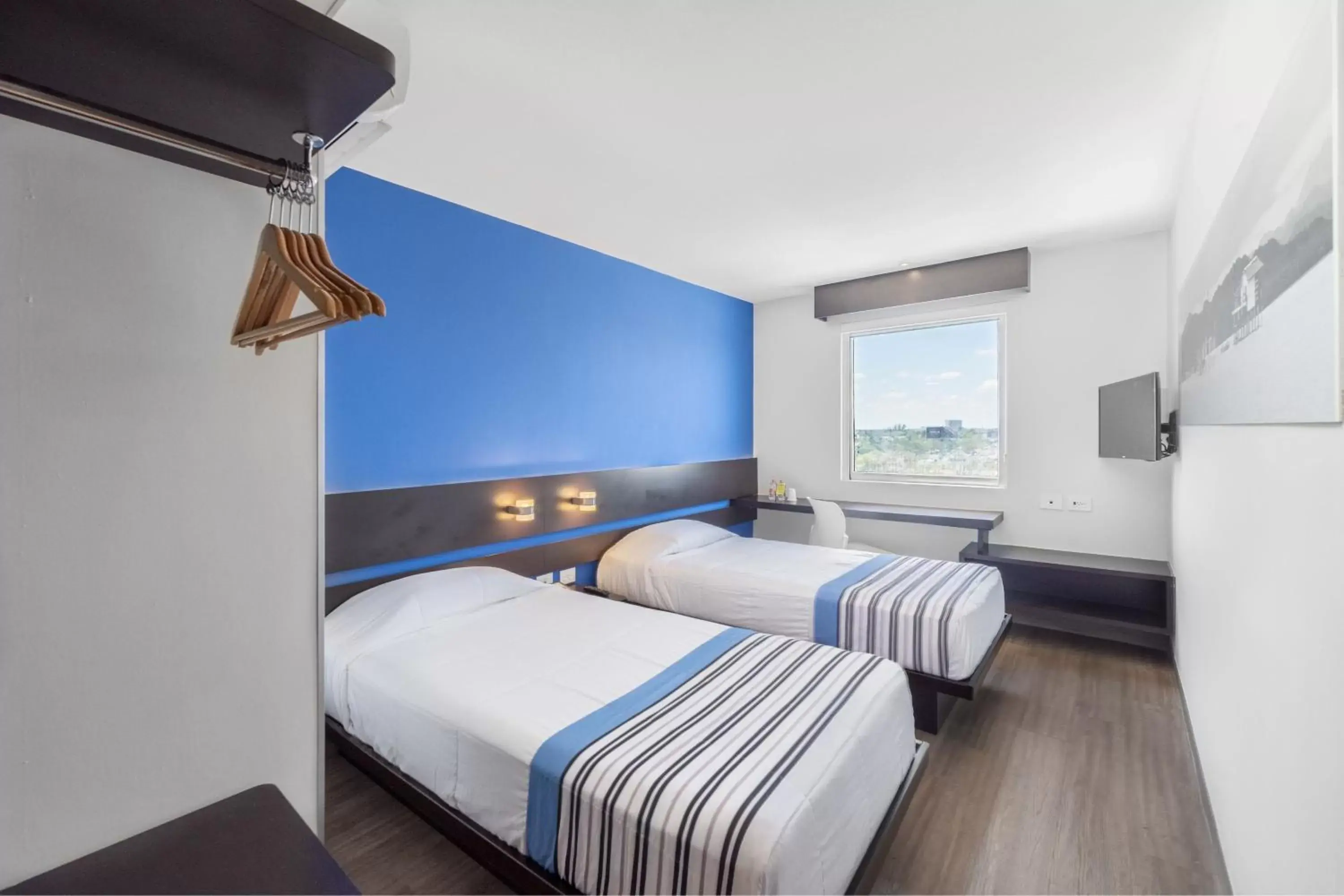 Photo of the whole room, Bed in City Express Junior by Marriott Merida Altabrisa