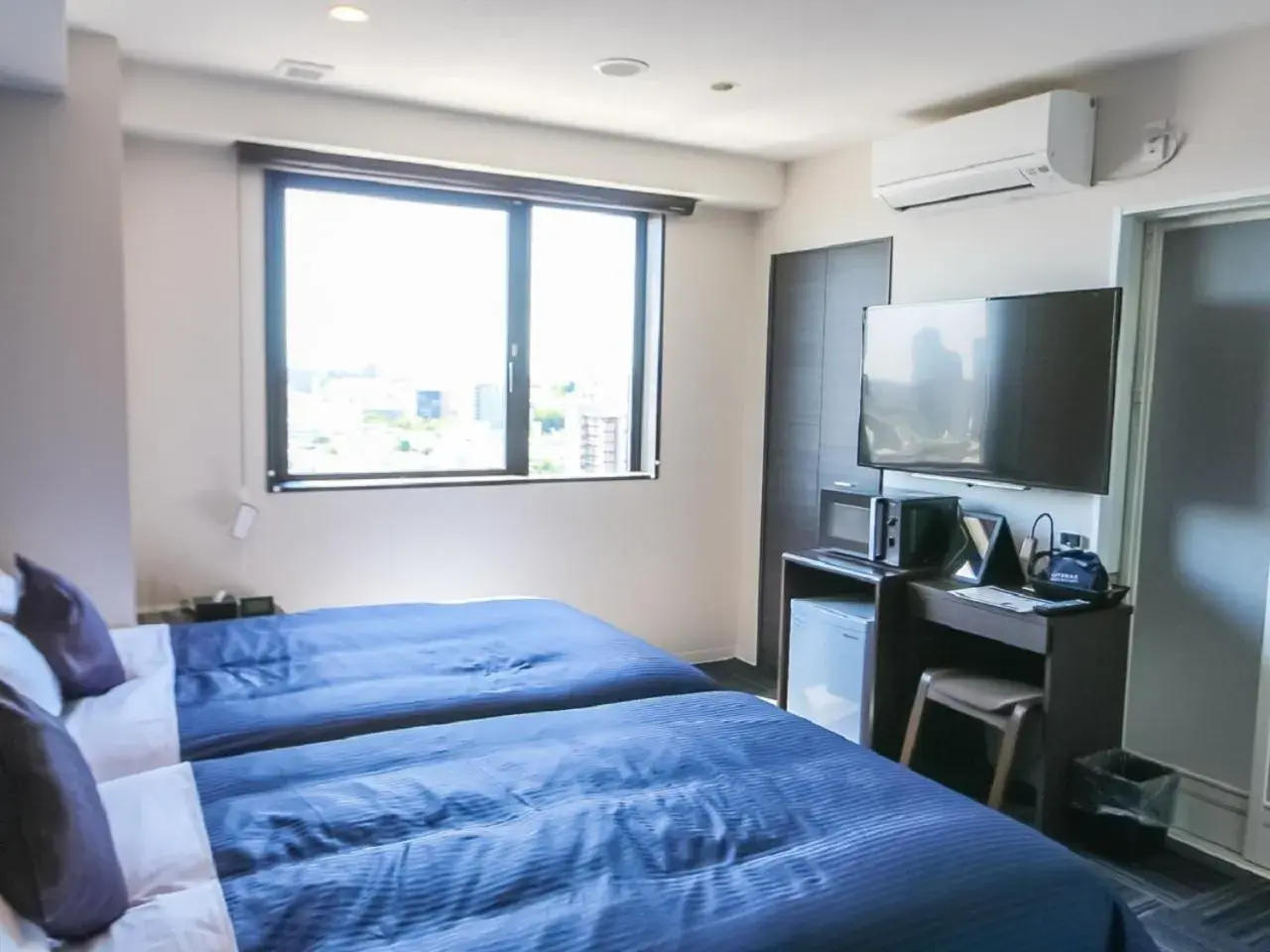 Bed in HOTEL LiVEMAX Takadanobaba Ekimae Bed in HOTEL LiVEMAX Takadanobaba Ekimae