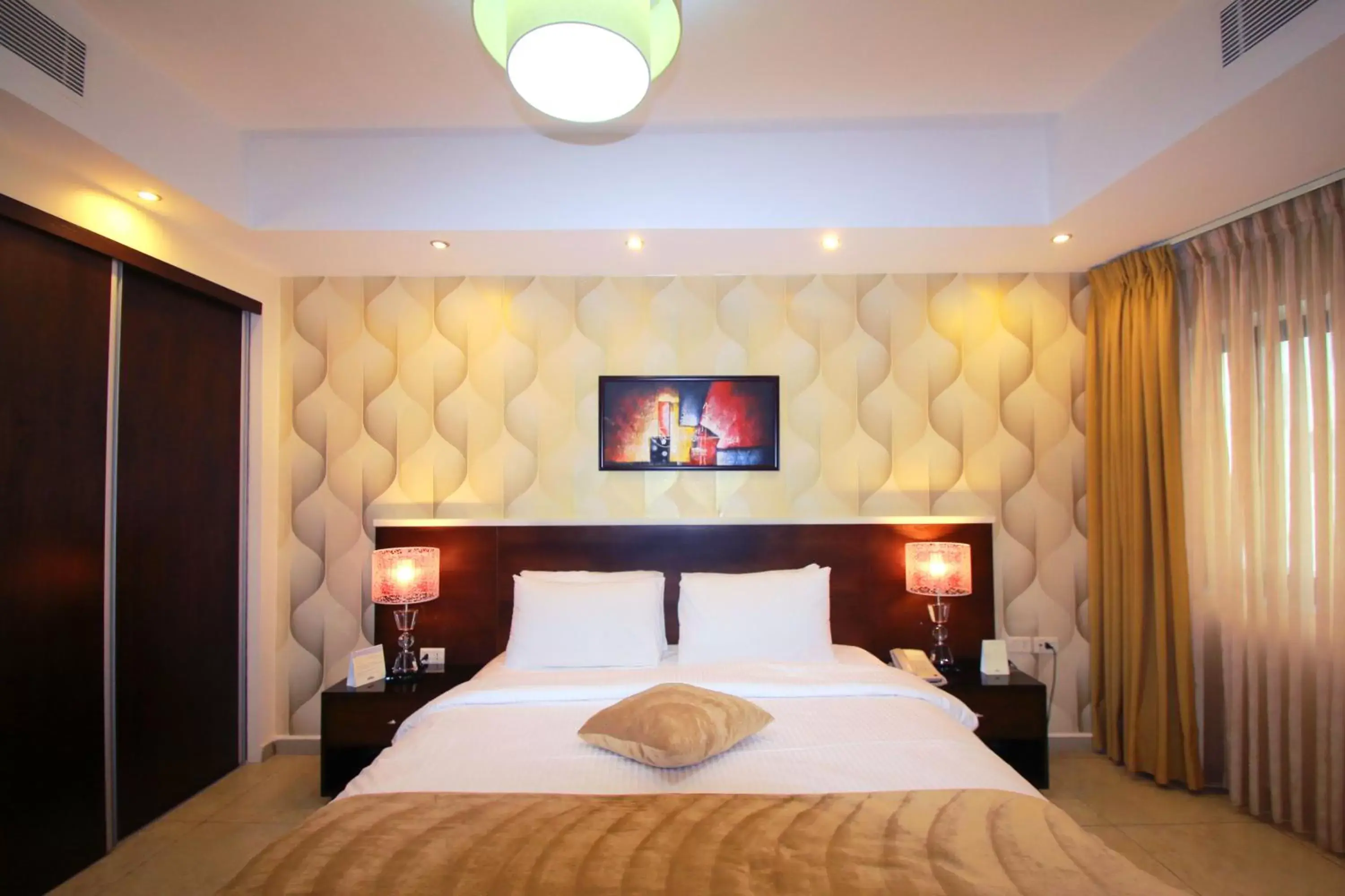 Bed in City Rose Hotel Suites Bed in City Rose Hotel Suites