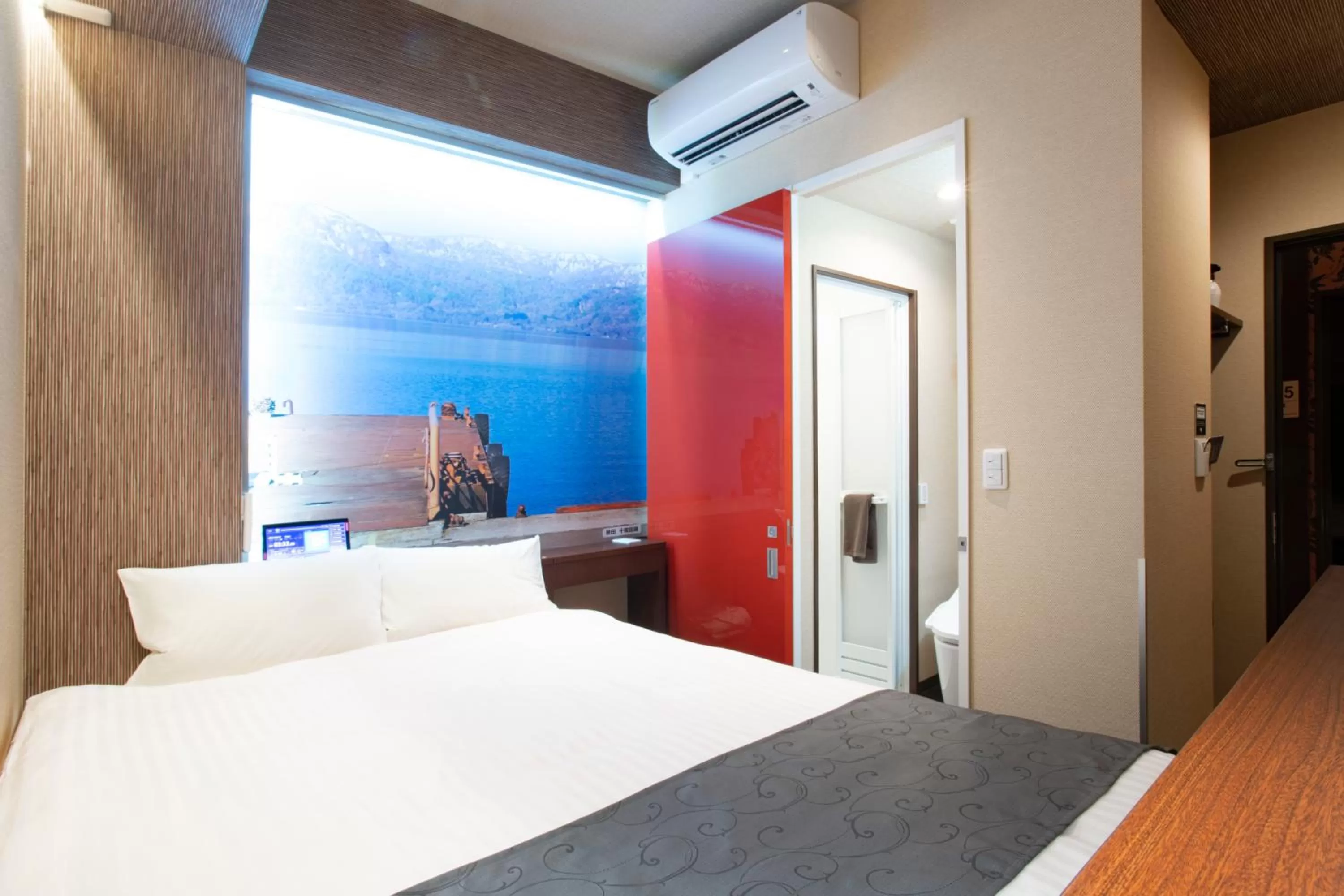 Photo of the whole room, Bed in Hotel Xcell Hiroshima Nagarekawa