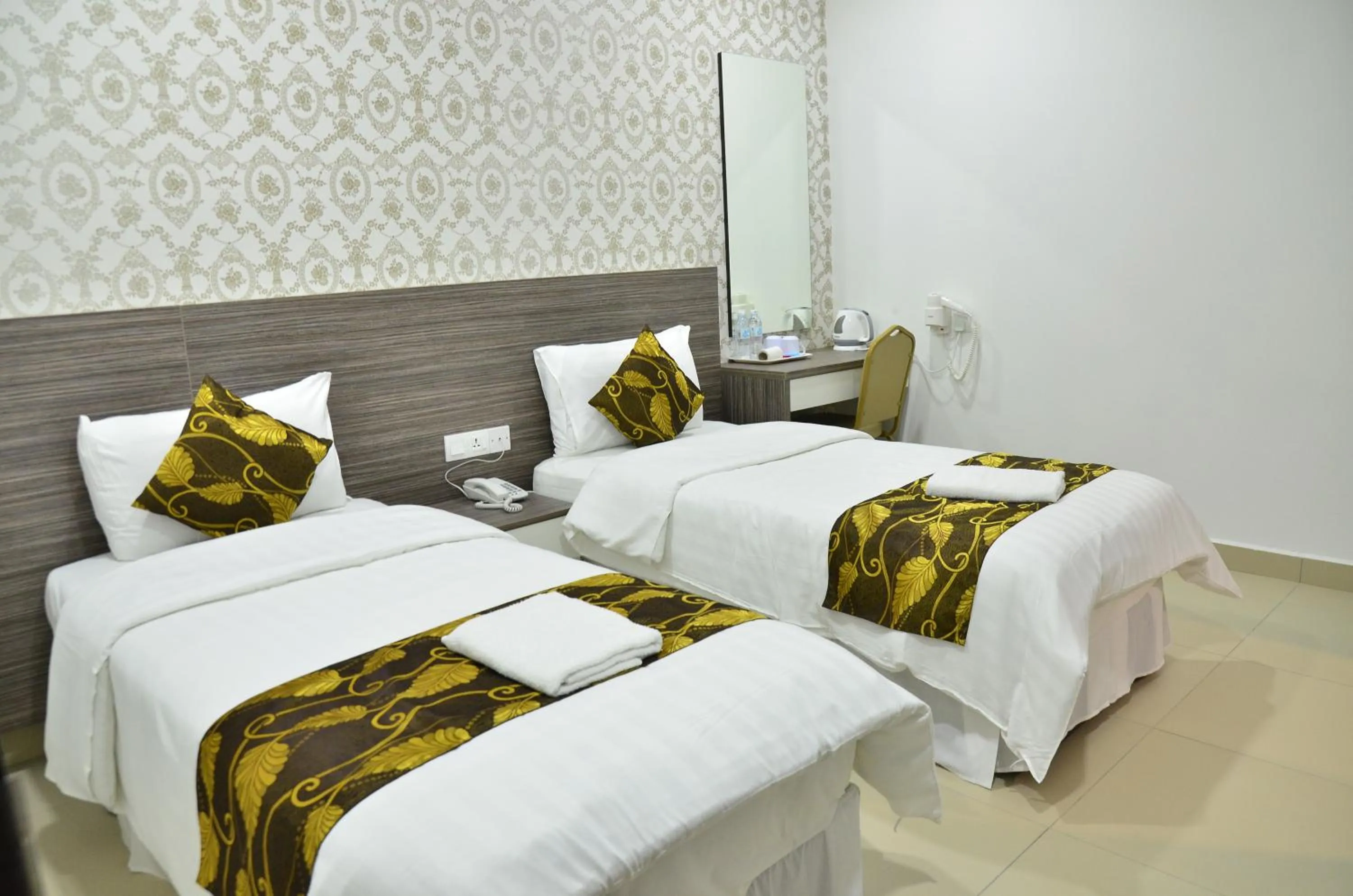 Bed in D'Metro Hotel