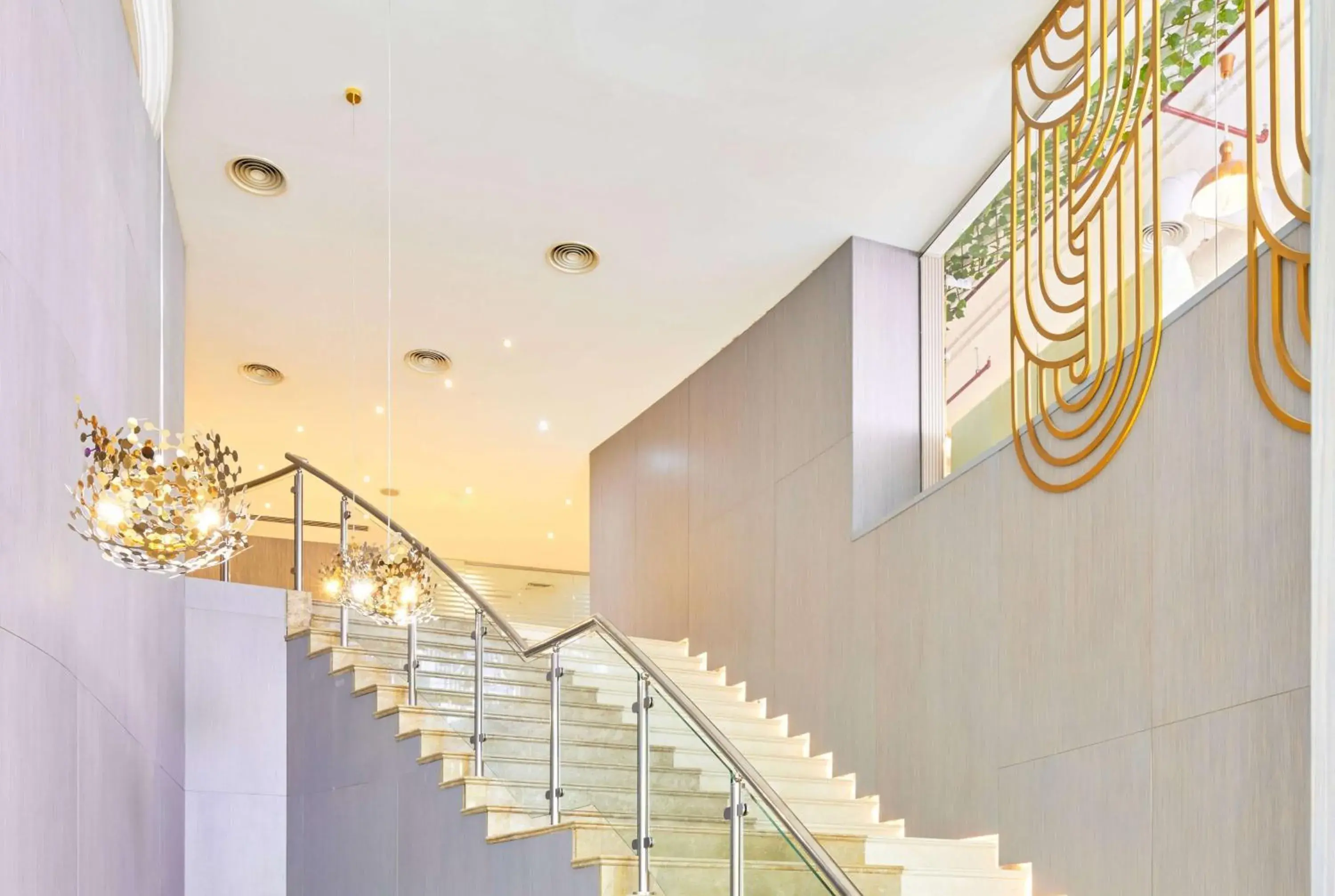 Lobby or reception in Ramada by Wyndham Doha Old Town Lobby or reception in Ramada by Wyndham Doha Old Town