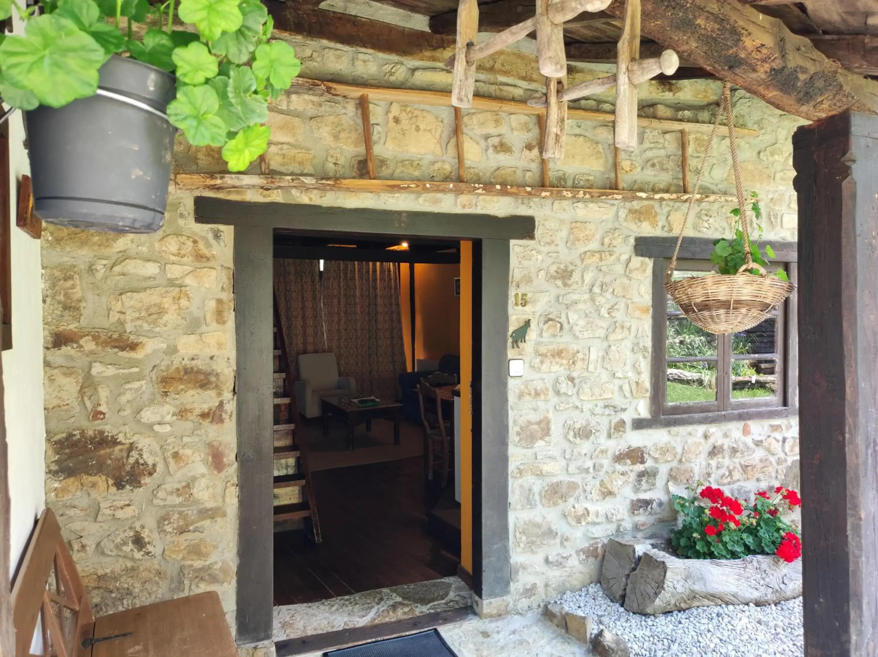 Facade/entrance, BBQ Facilities in Viviendas Rurales El Covaju