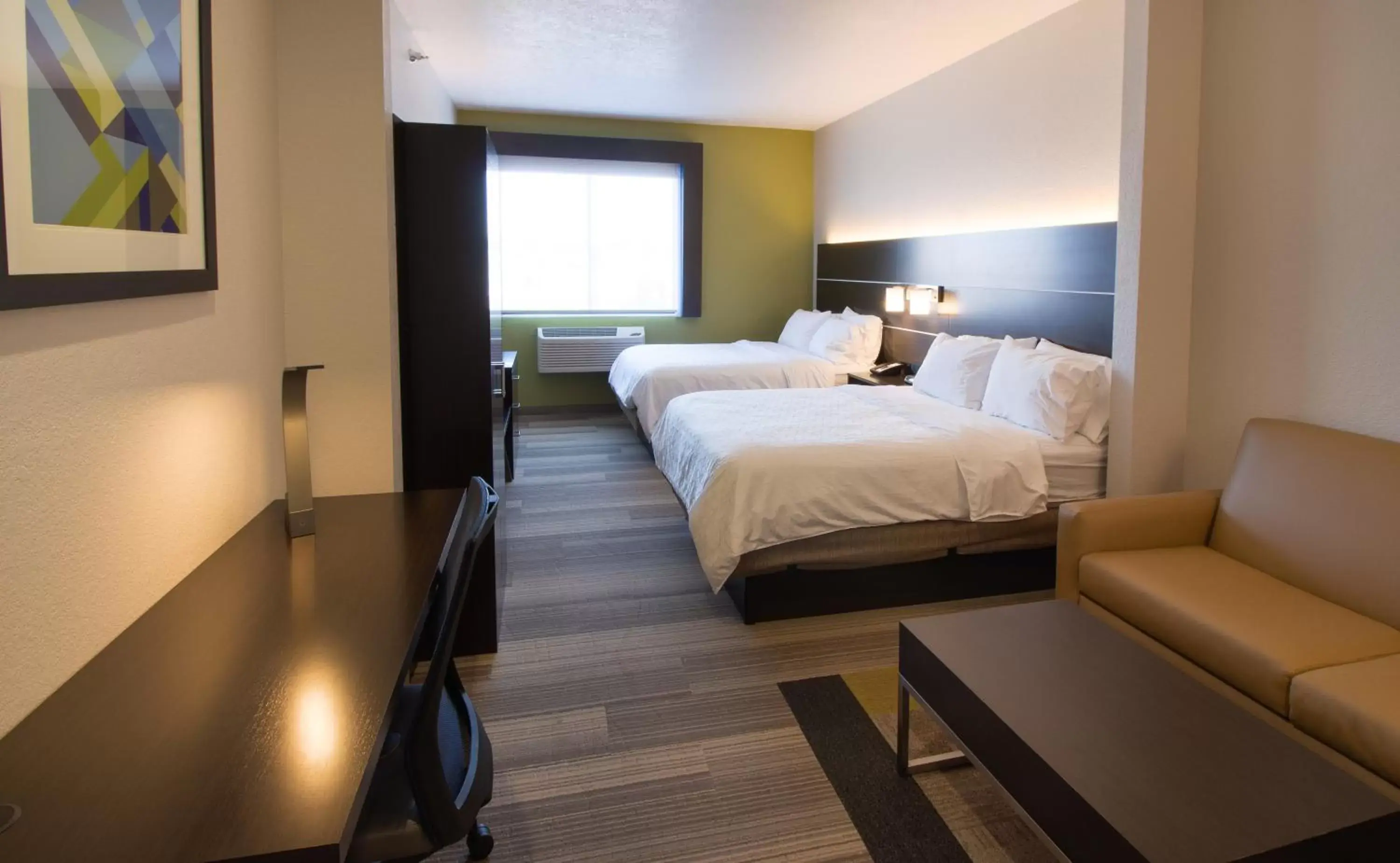 Bed in Holiday Inn Express & Suites - Worthington, an IHG Hotel