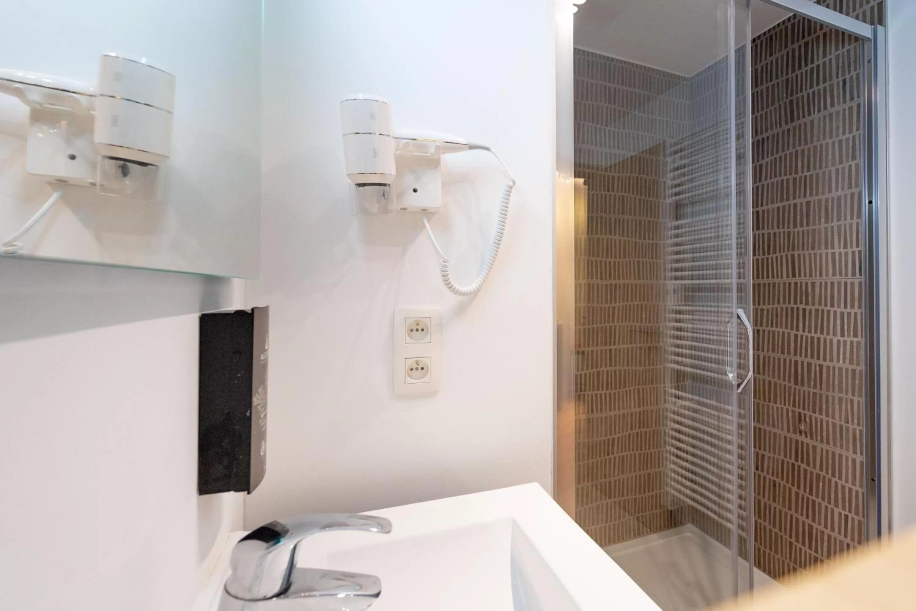 Bathroom in Appart hôtel En Ville