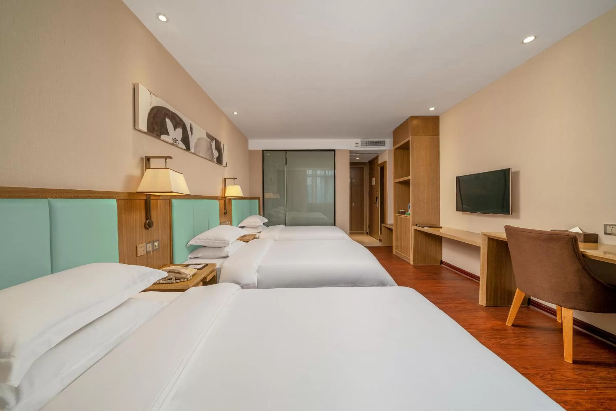 Bed in Guangzhou Boyi Hotel