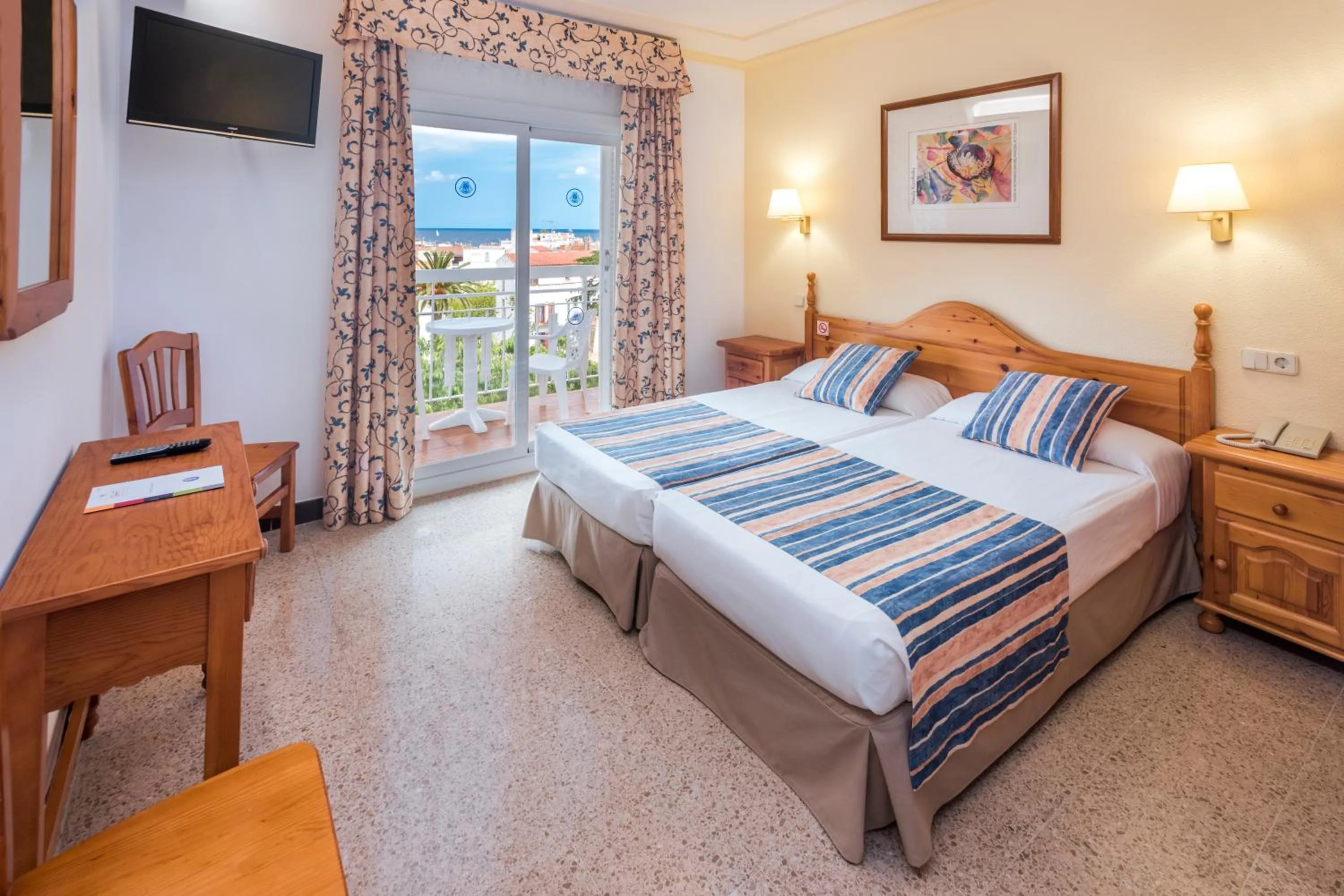 Photo of the whole room, Bed in Hotel GHT Neptuno-Tossa & Venus SPA