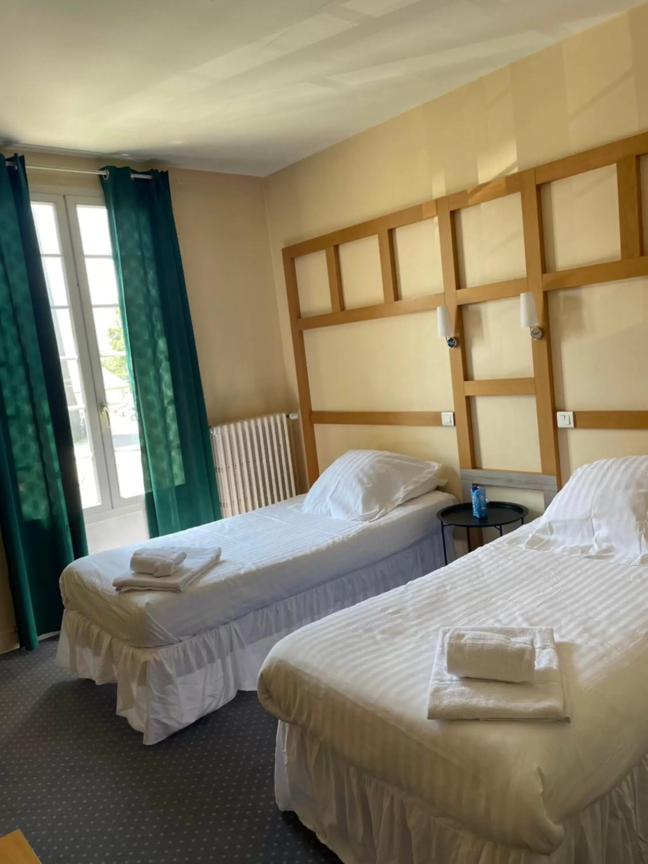 Bed in Hôtel La Capitainerie