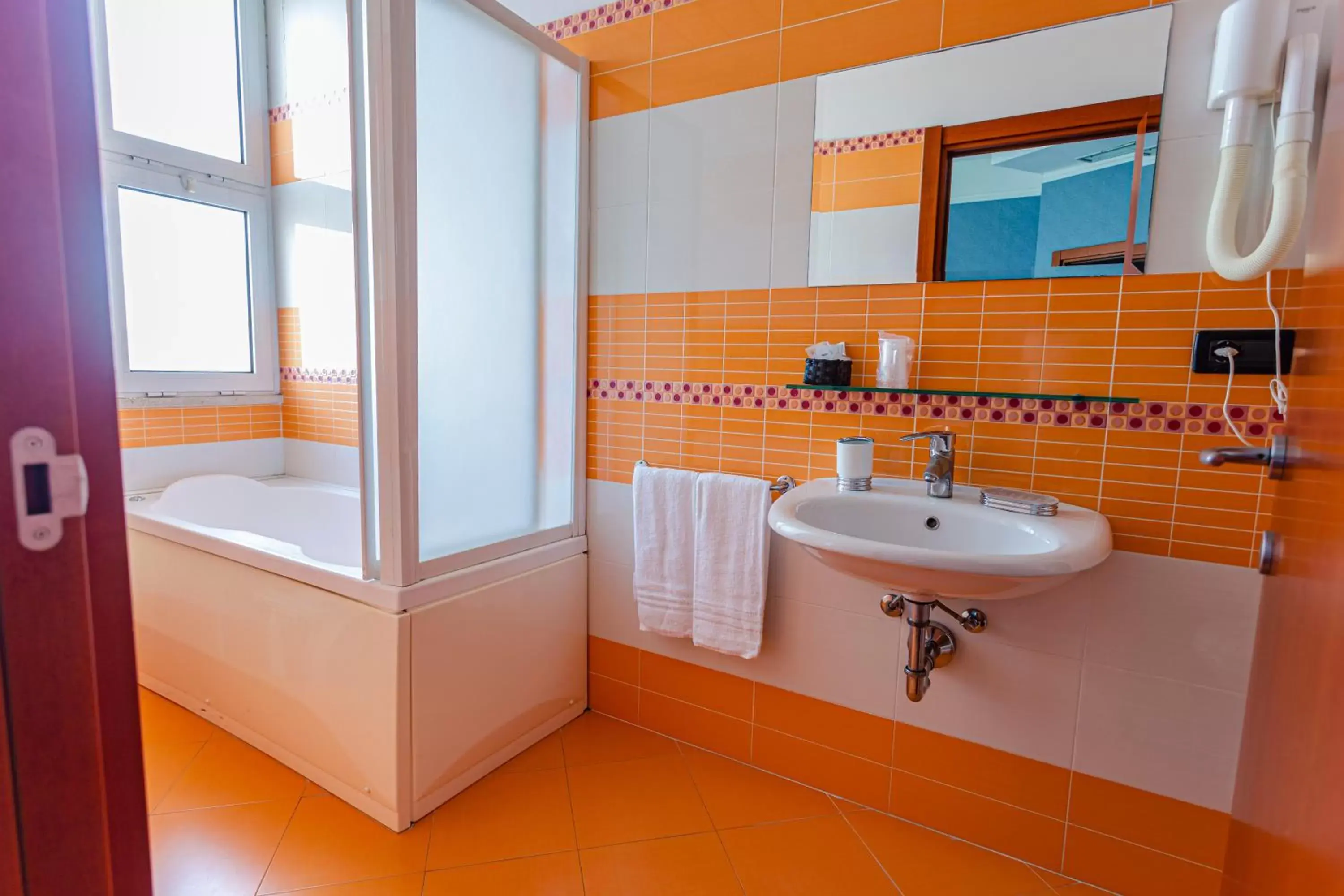 Bathroom in Residence & Suites