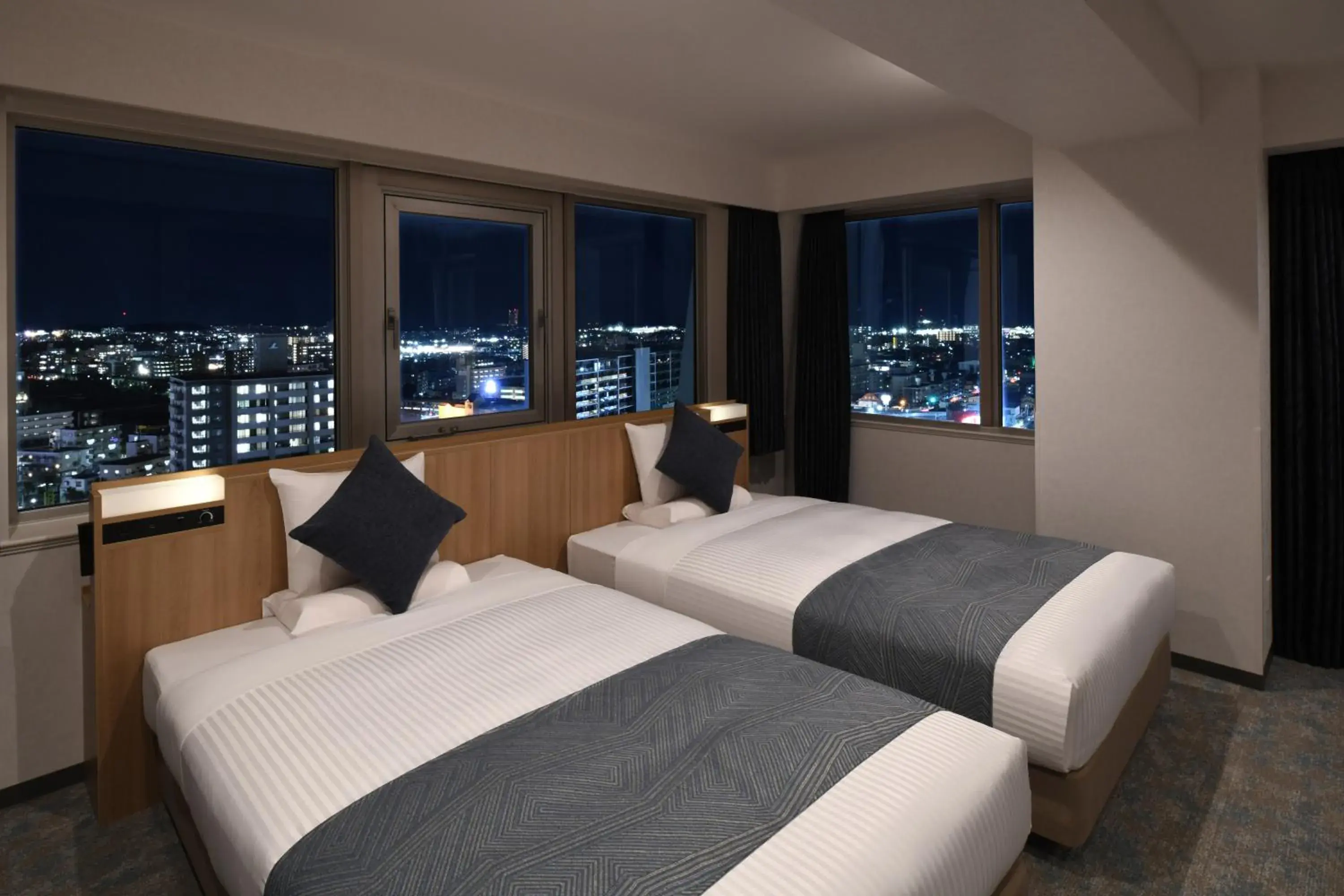Photo of the whole room, Bed in Hotel Sky Tower Miyazaki Ekimae