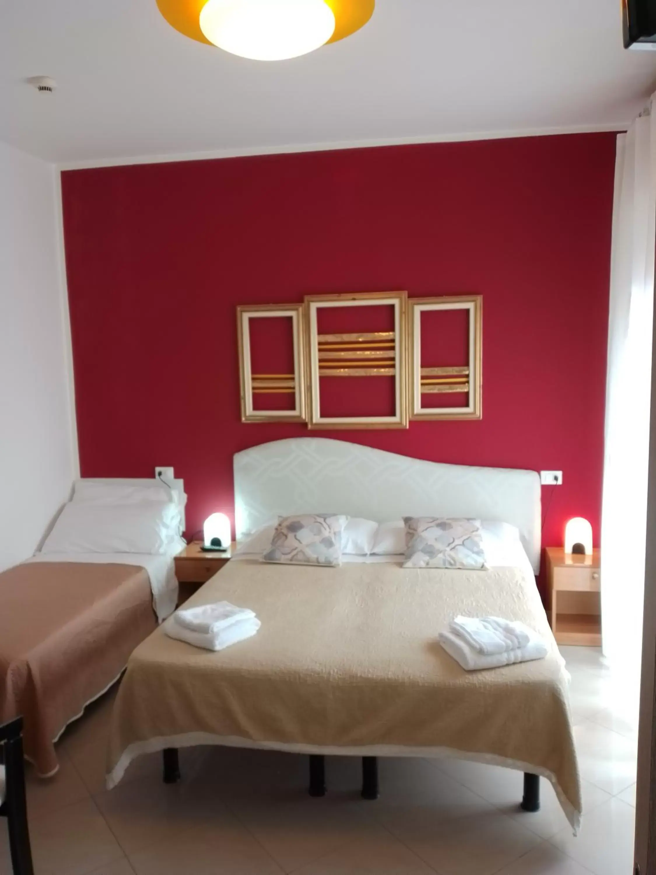 Bed in Hotel Riposo