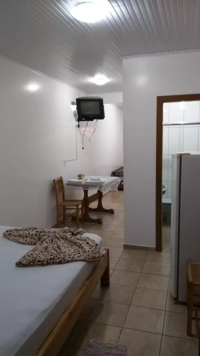 Bed in Hotel Pousada Rolantchê