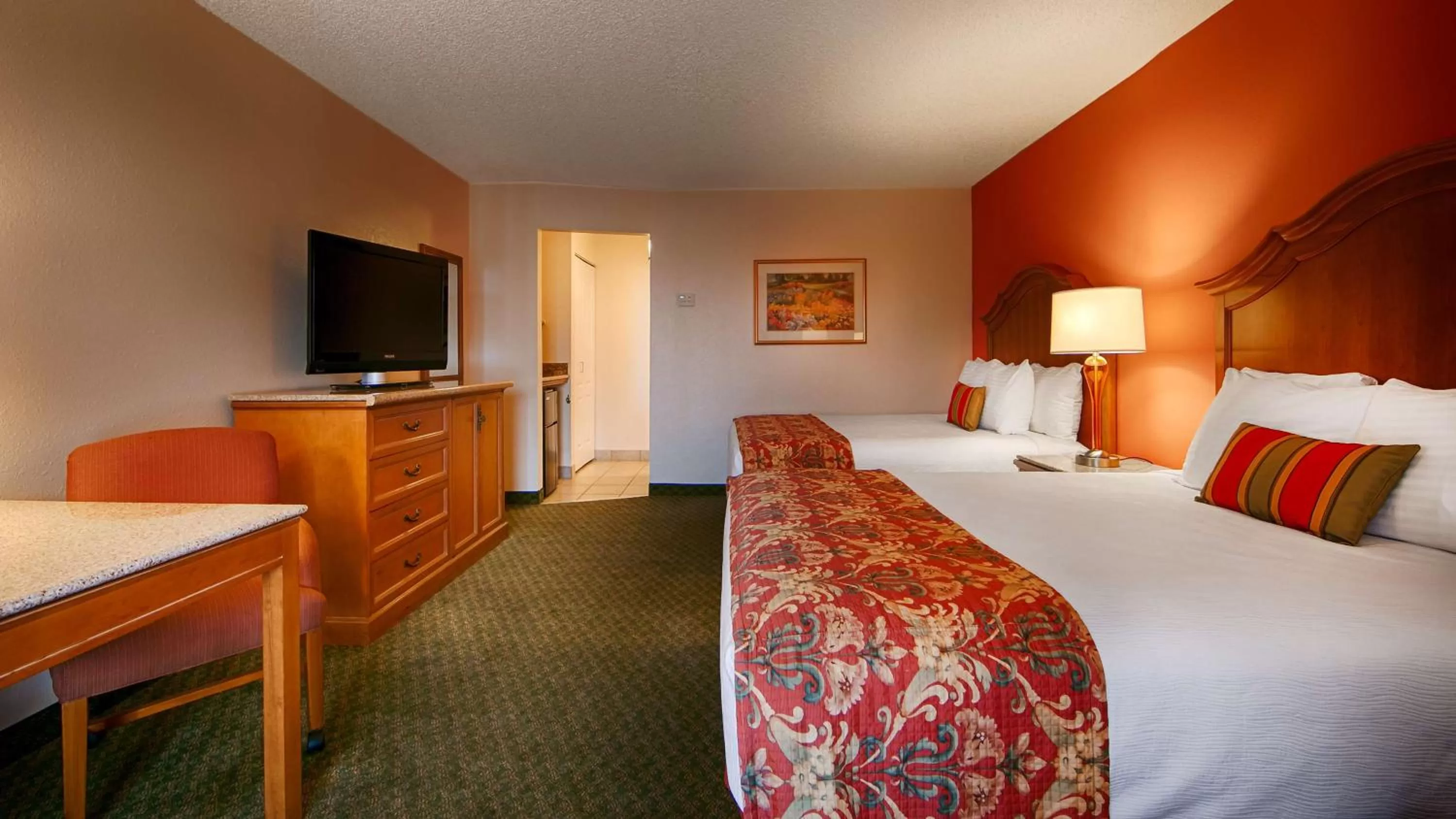 Queen Room with Two Queen Beds with Roll-In Shower in Best Western Plus A Wayfarer's Inn & Suites