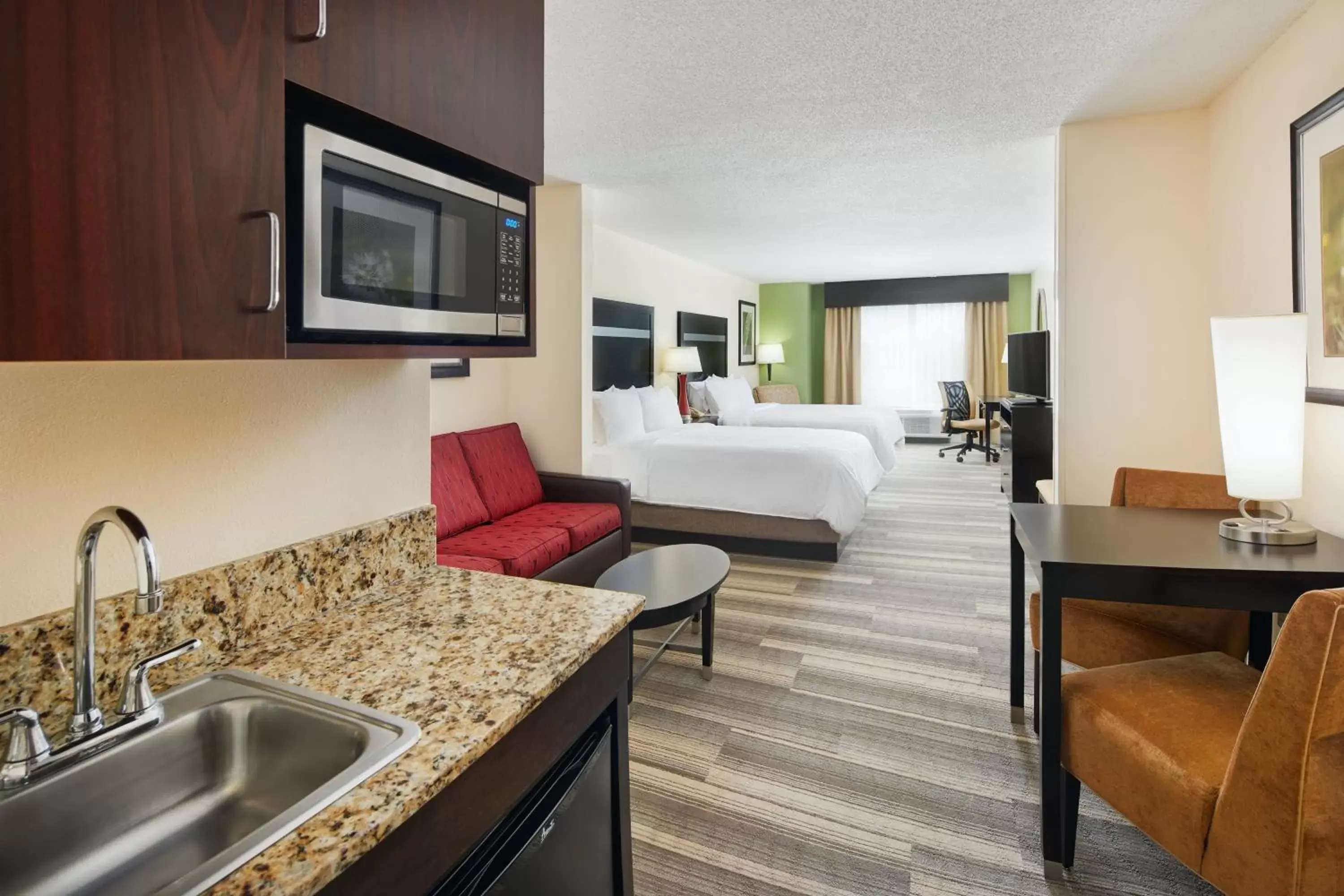 Photo of the whole room, Kitchen/Kitchenette in Holiday Inn Express & Suites I-26 & Us 29 At Westgate Mall, an IHG Hotel