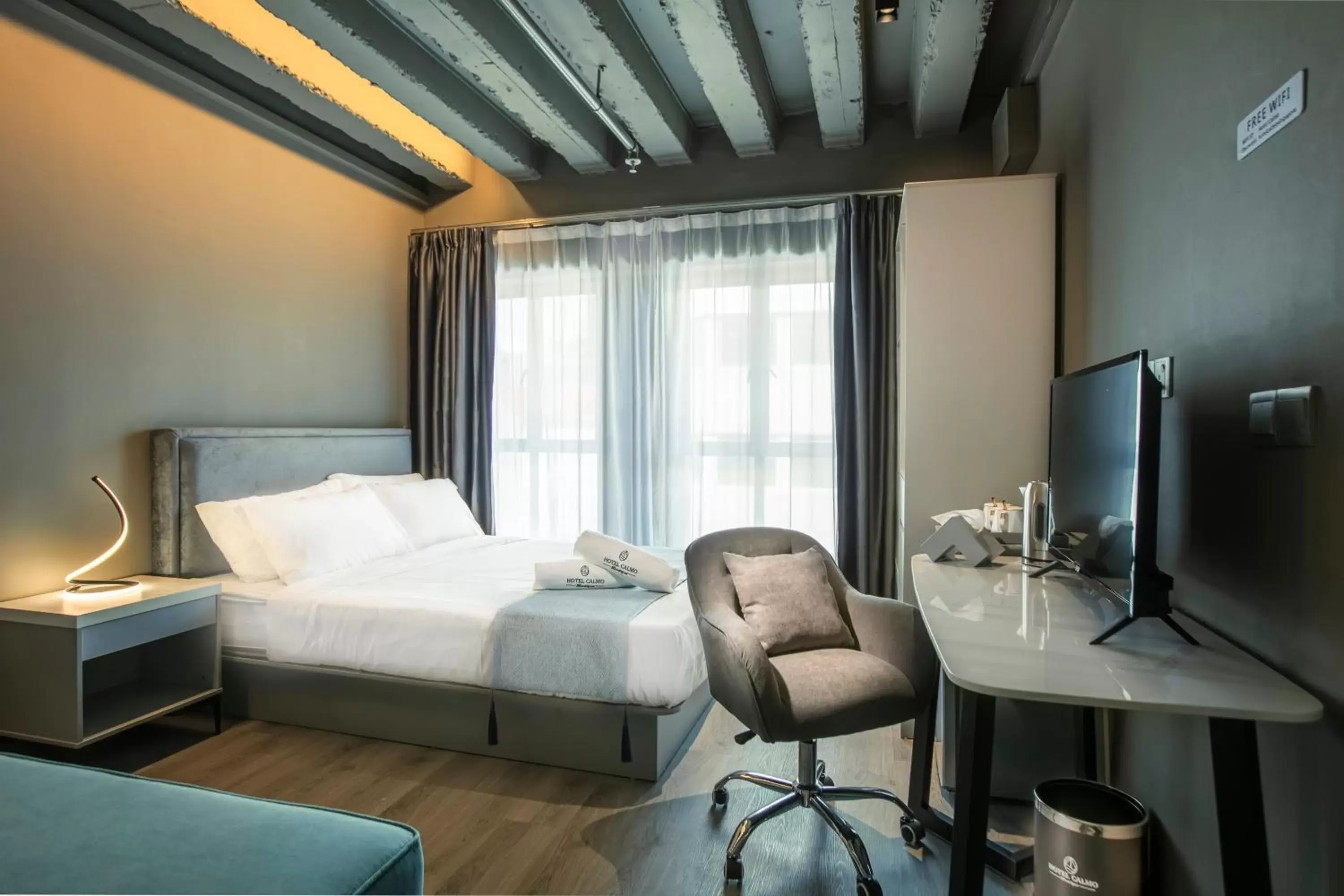 Bed in Hotel Calmo Bugis Bed in Hotel Calmo Bugis