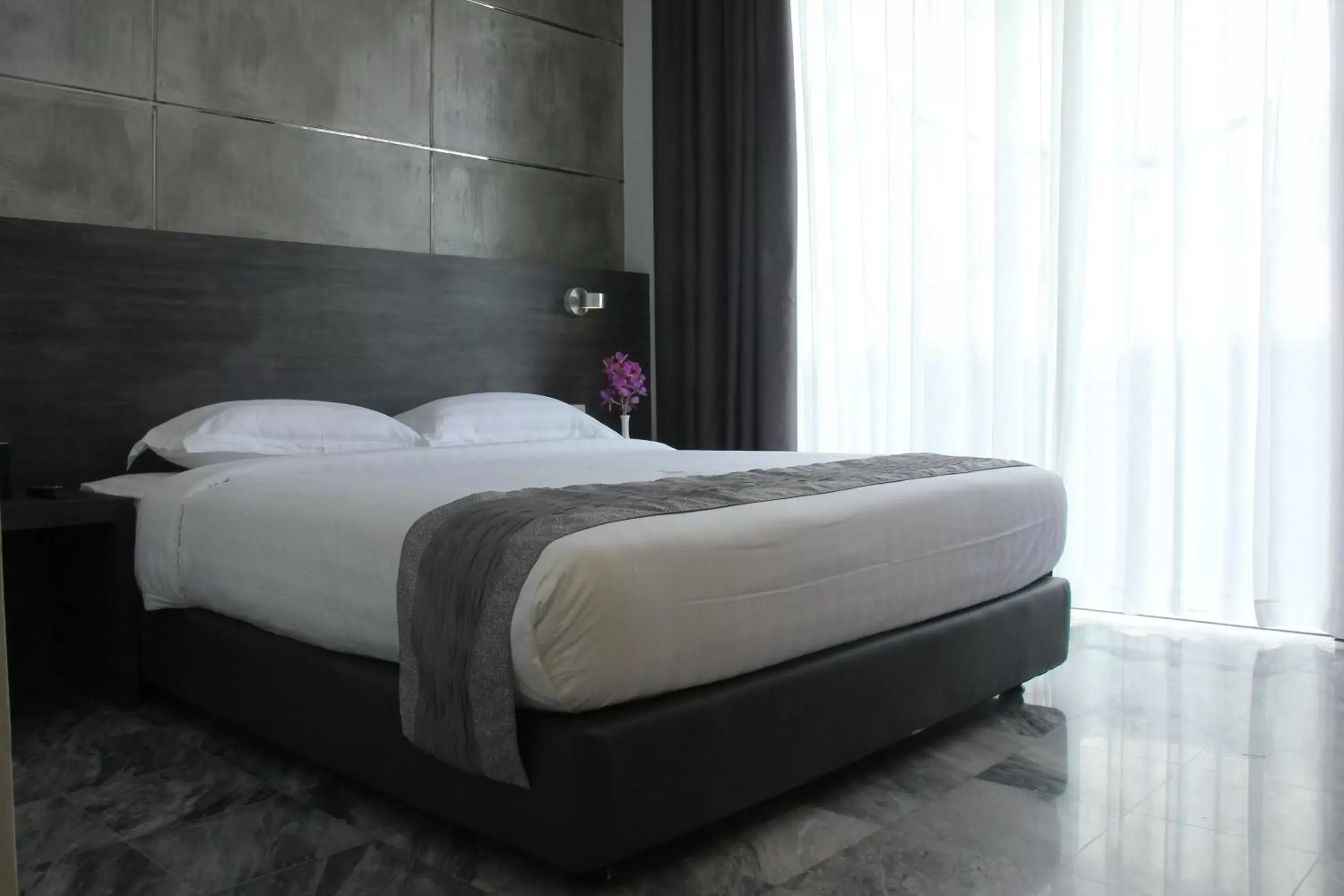 Bed in Dreamtel Jakarta